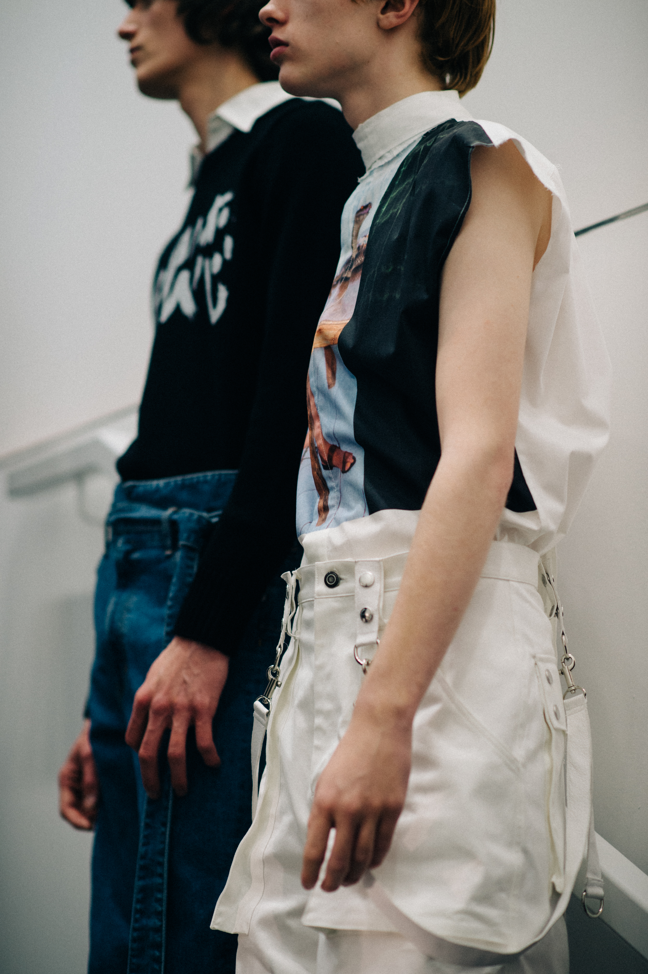 Two models white wall