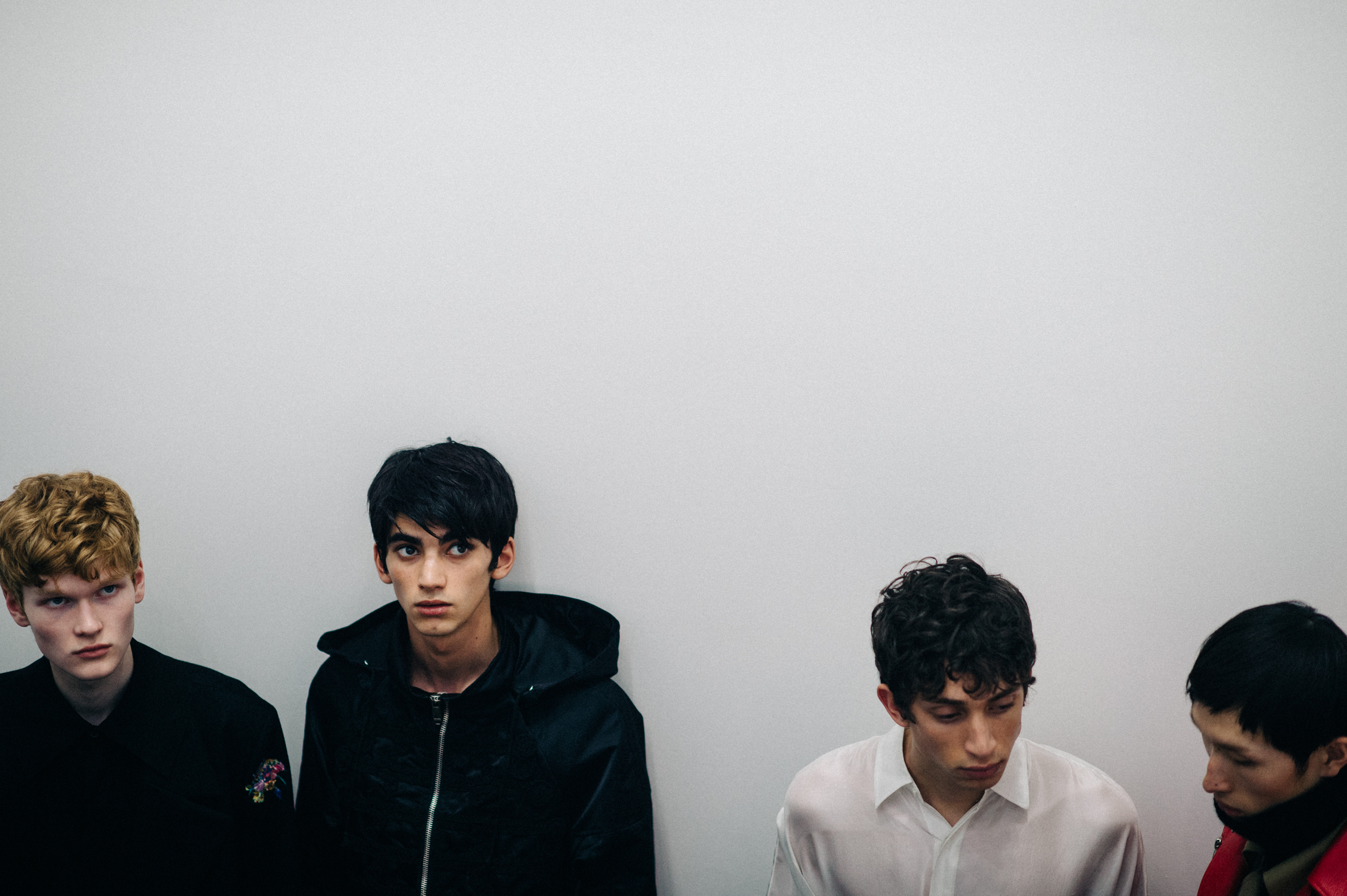 Four male models lined up