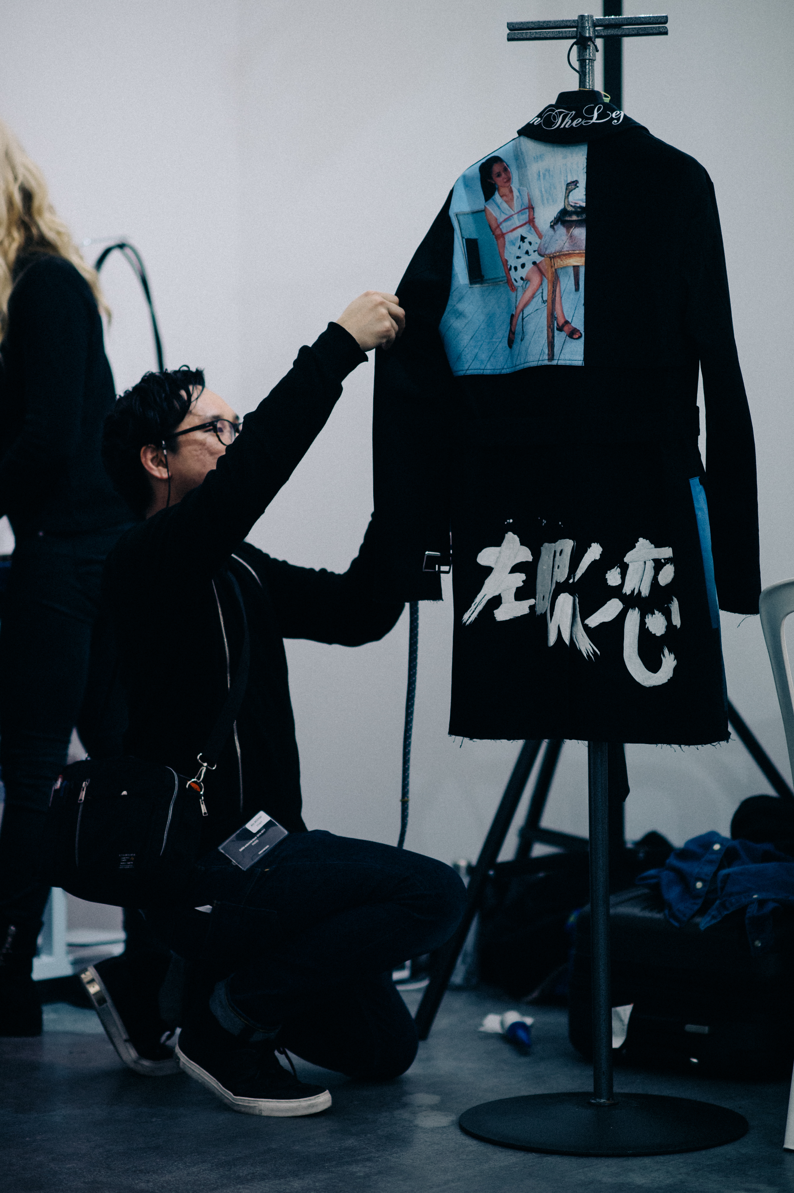 Man steaming coat