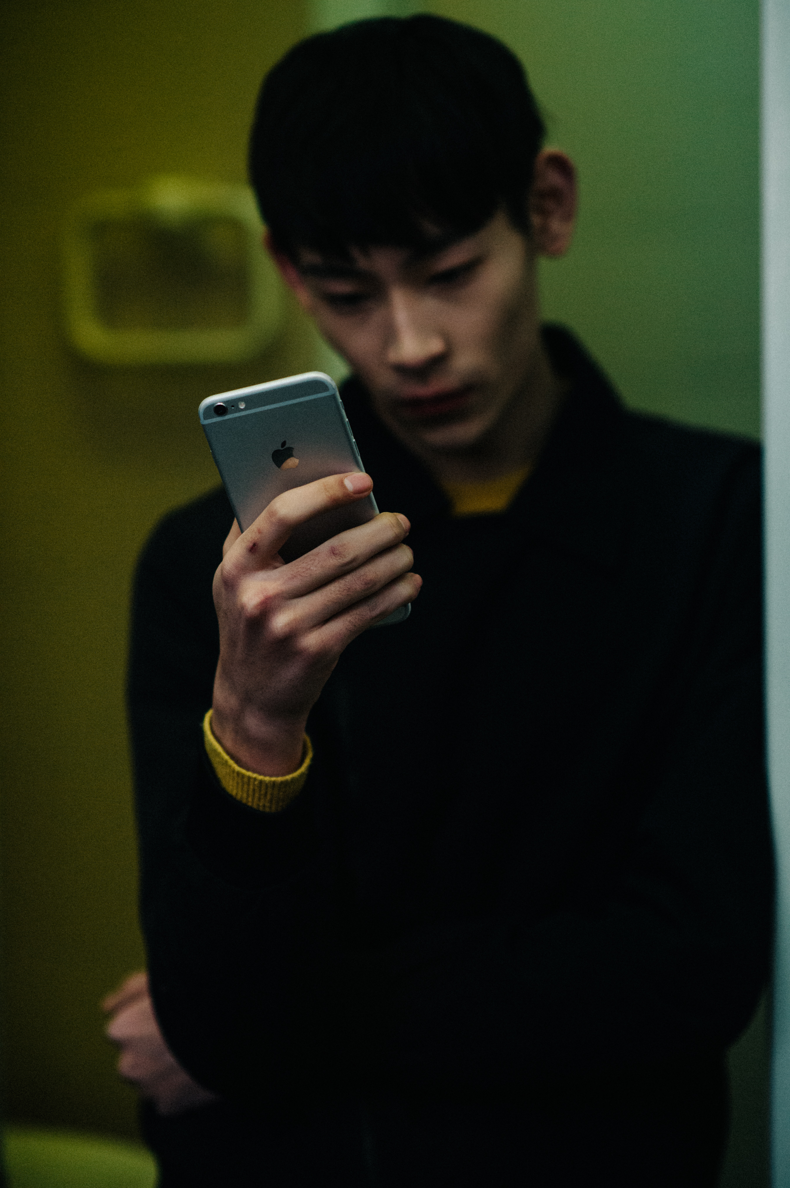 Asian male model with iPhone