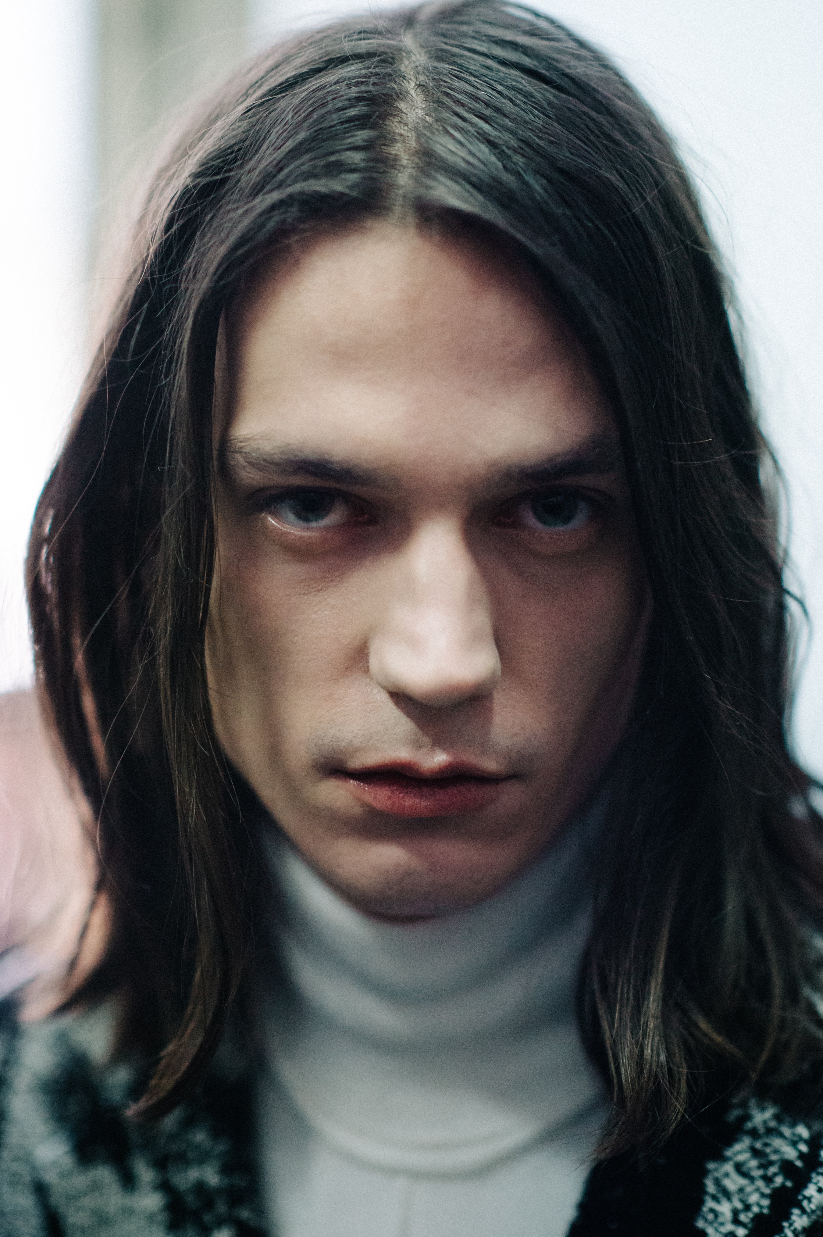 Portrait of a male model long hair