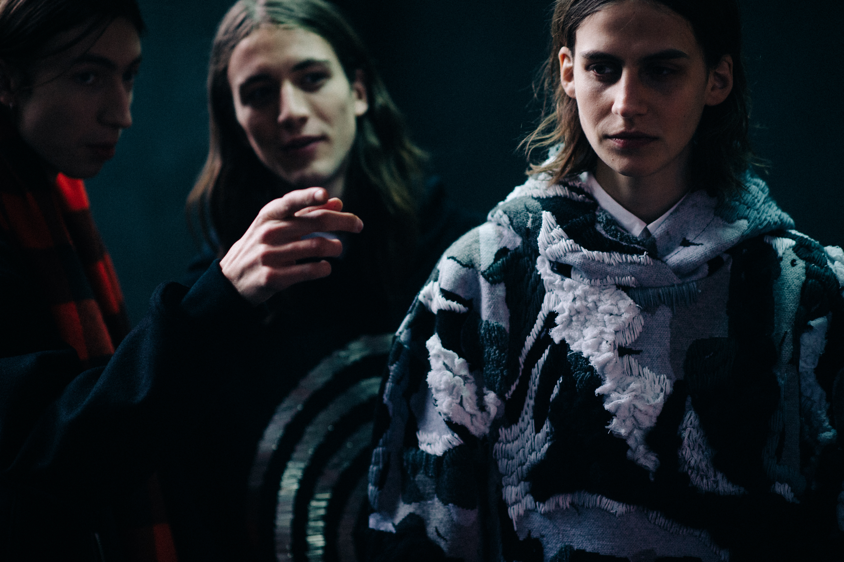 Three male models before show