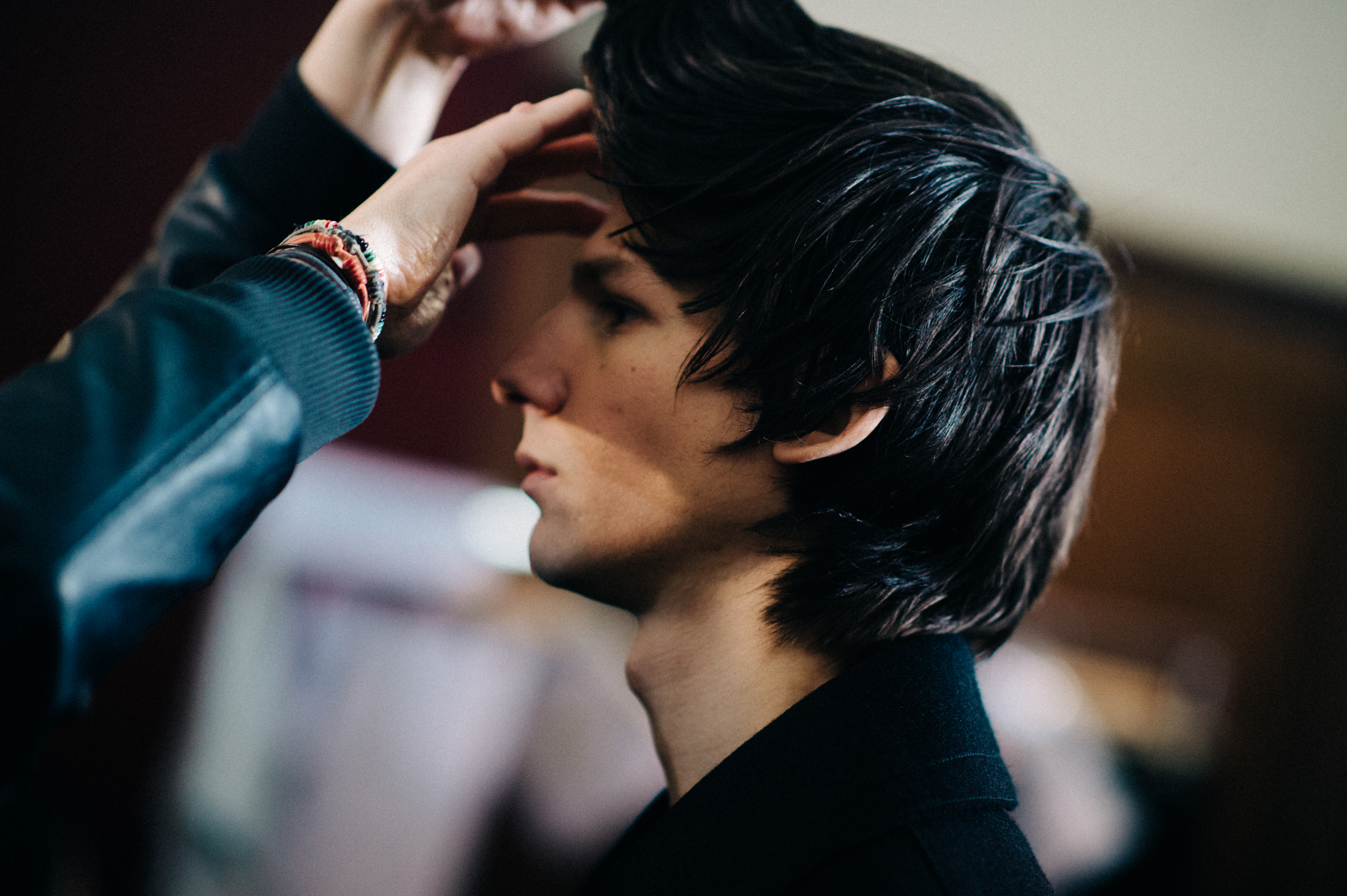 Male model getting hair done