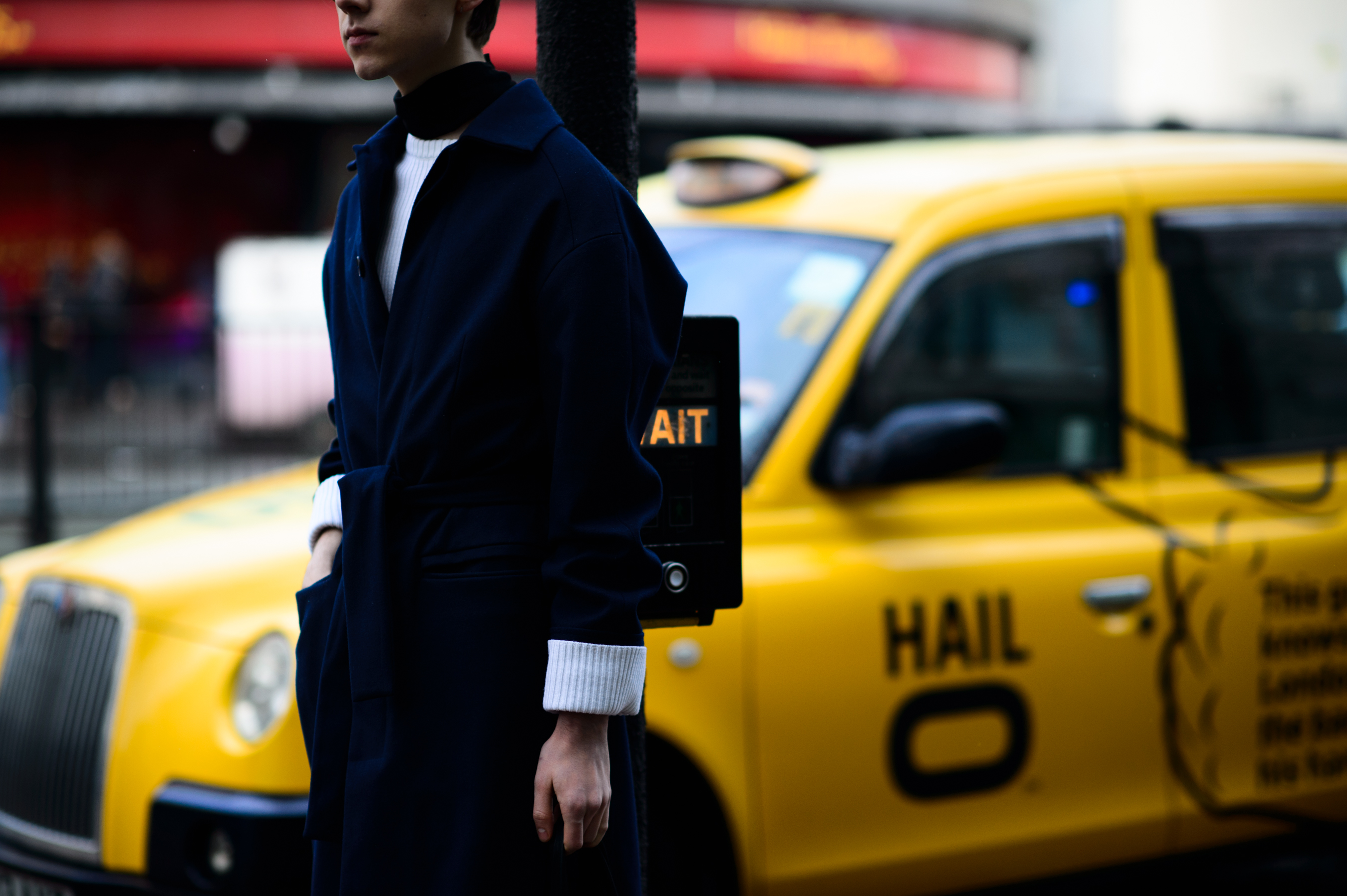 Man wearing blue coat