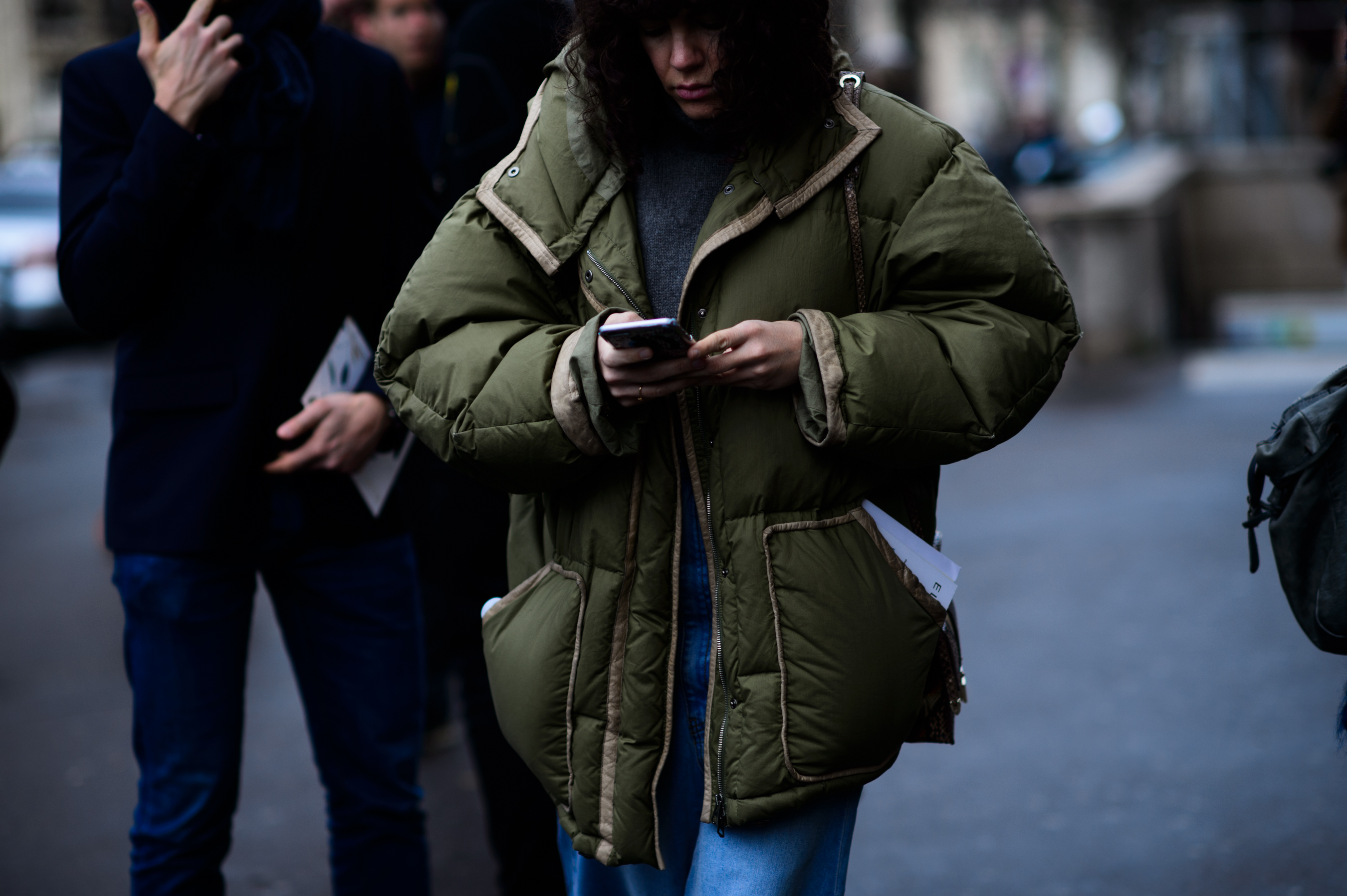 Woman wearing green jacket