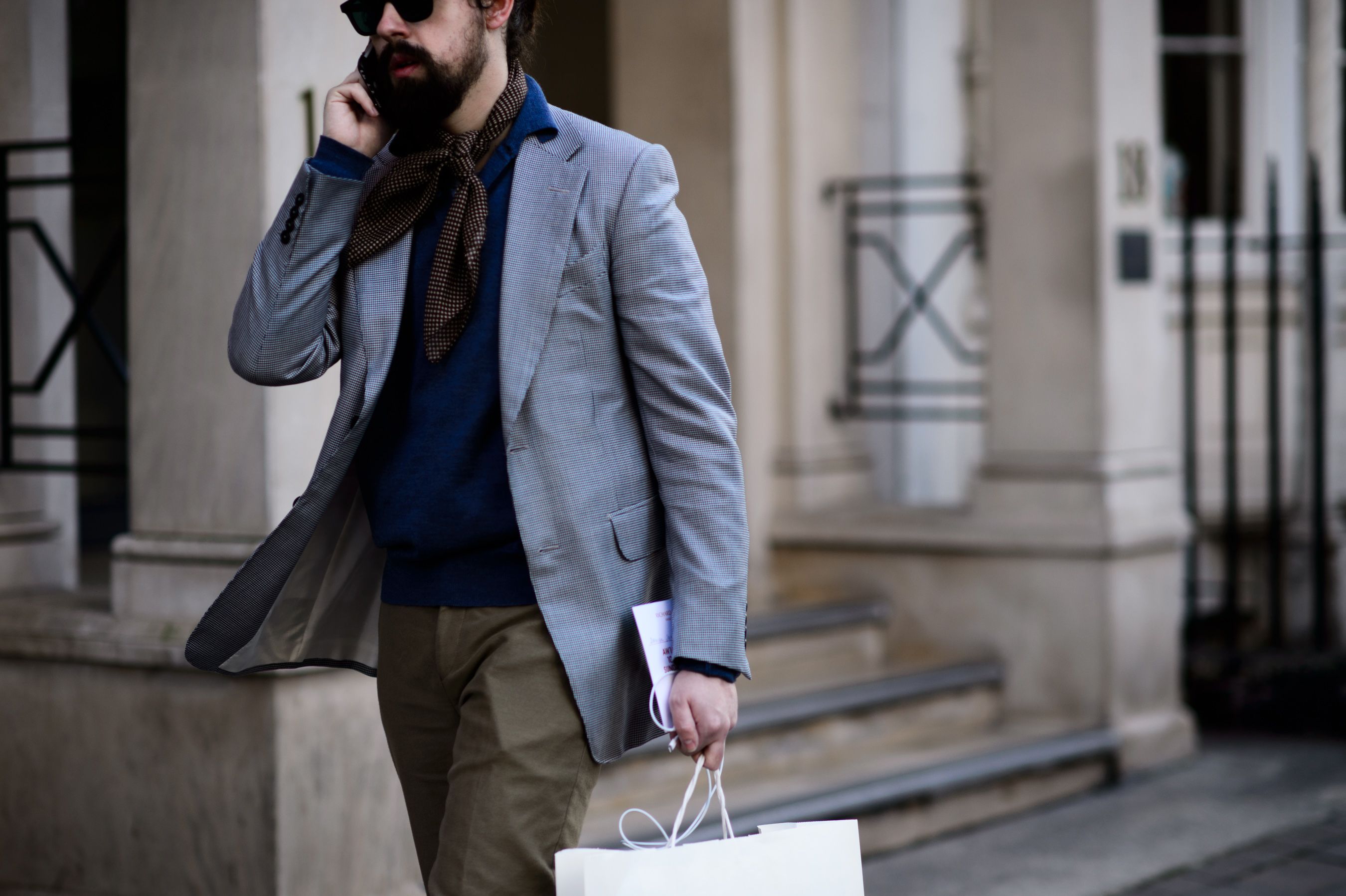 Man wearing neck scarf