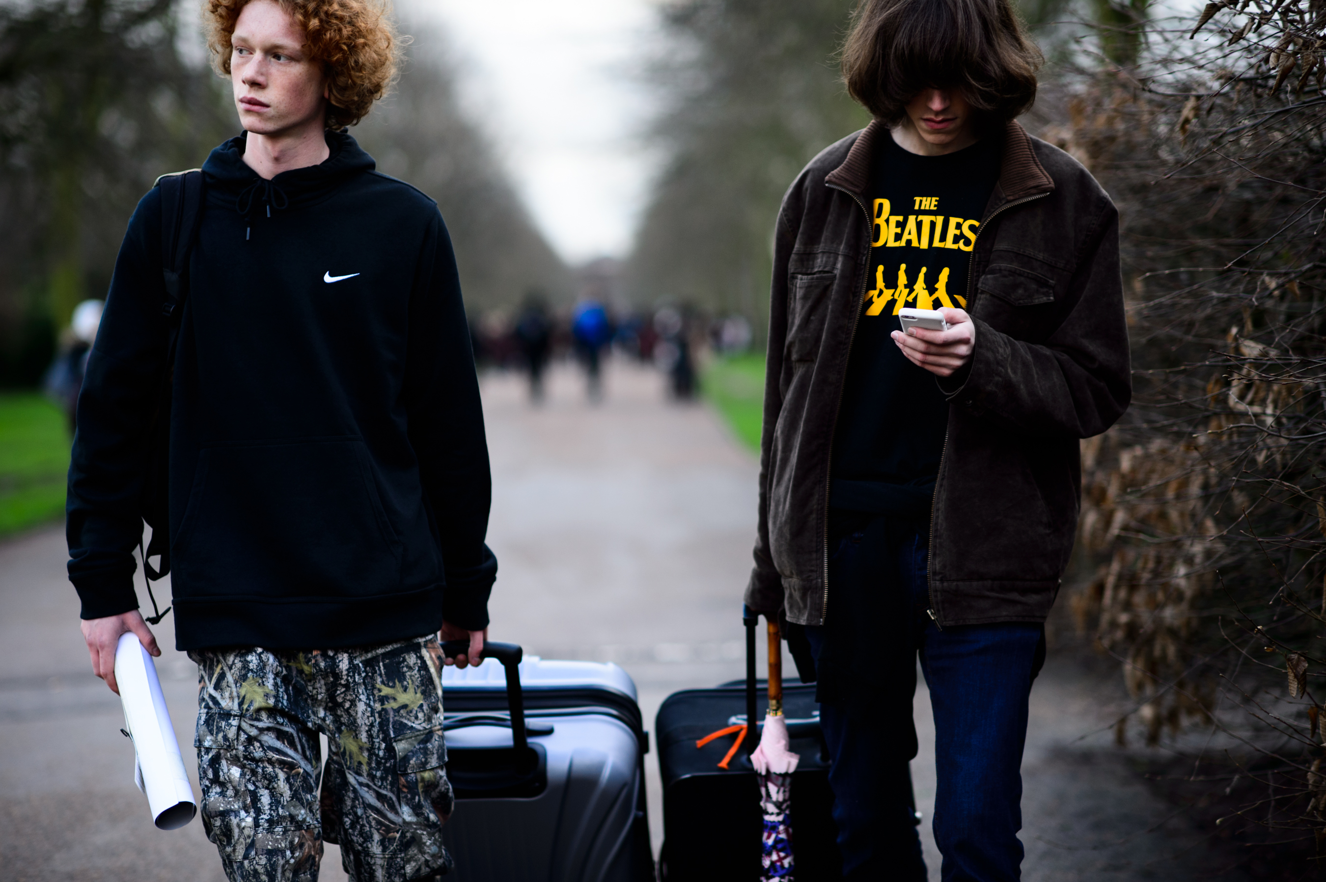 Two male models after the show