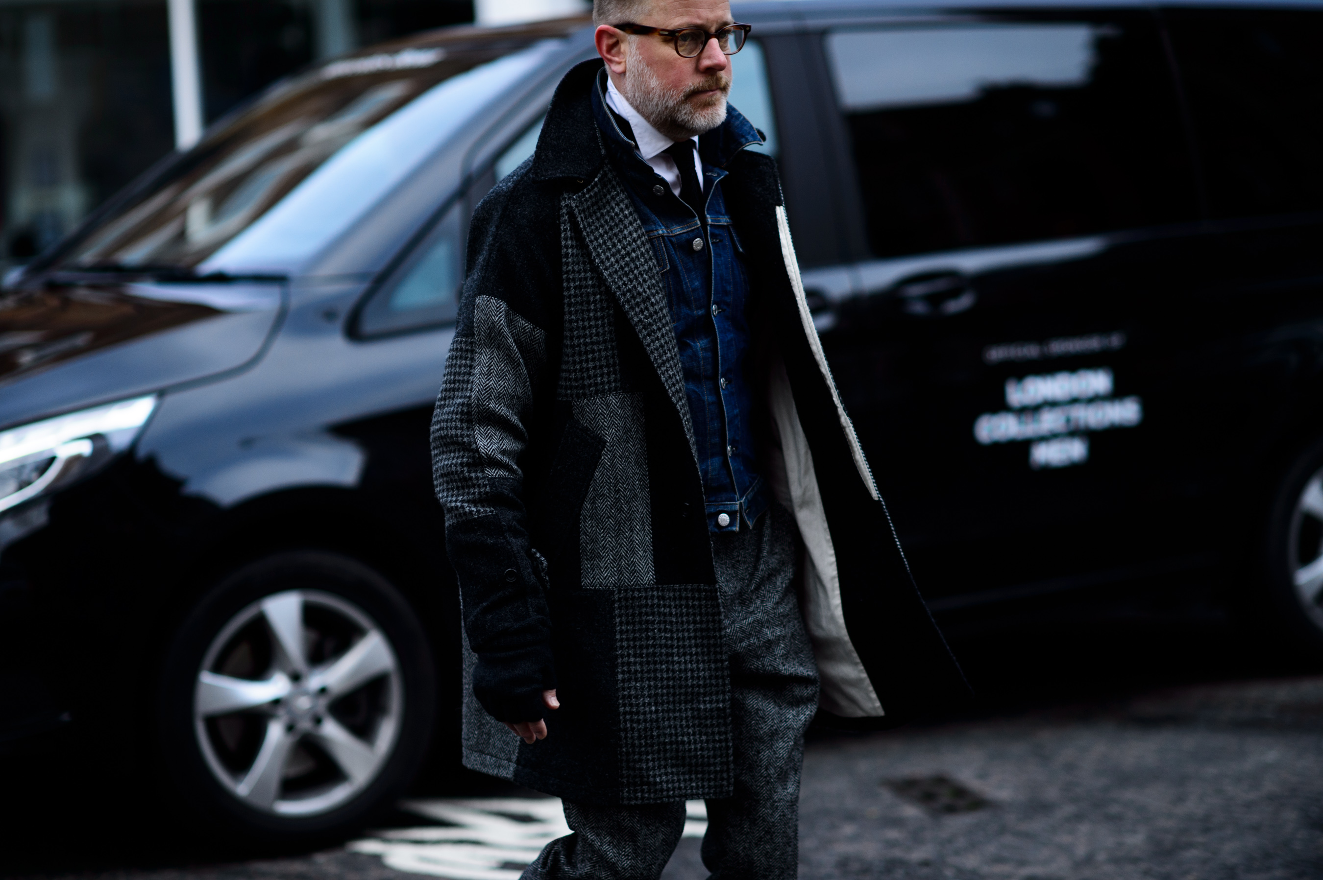 British man wearing denim and patchwork