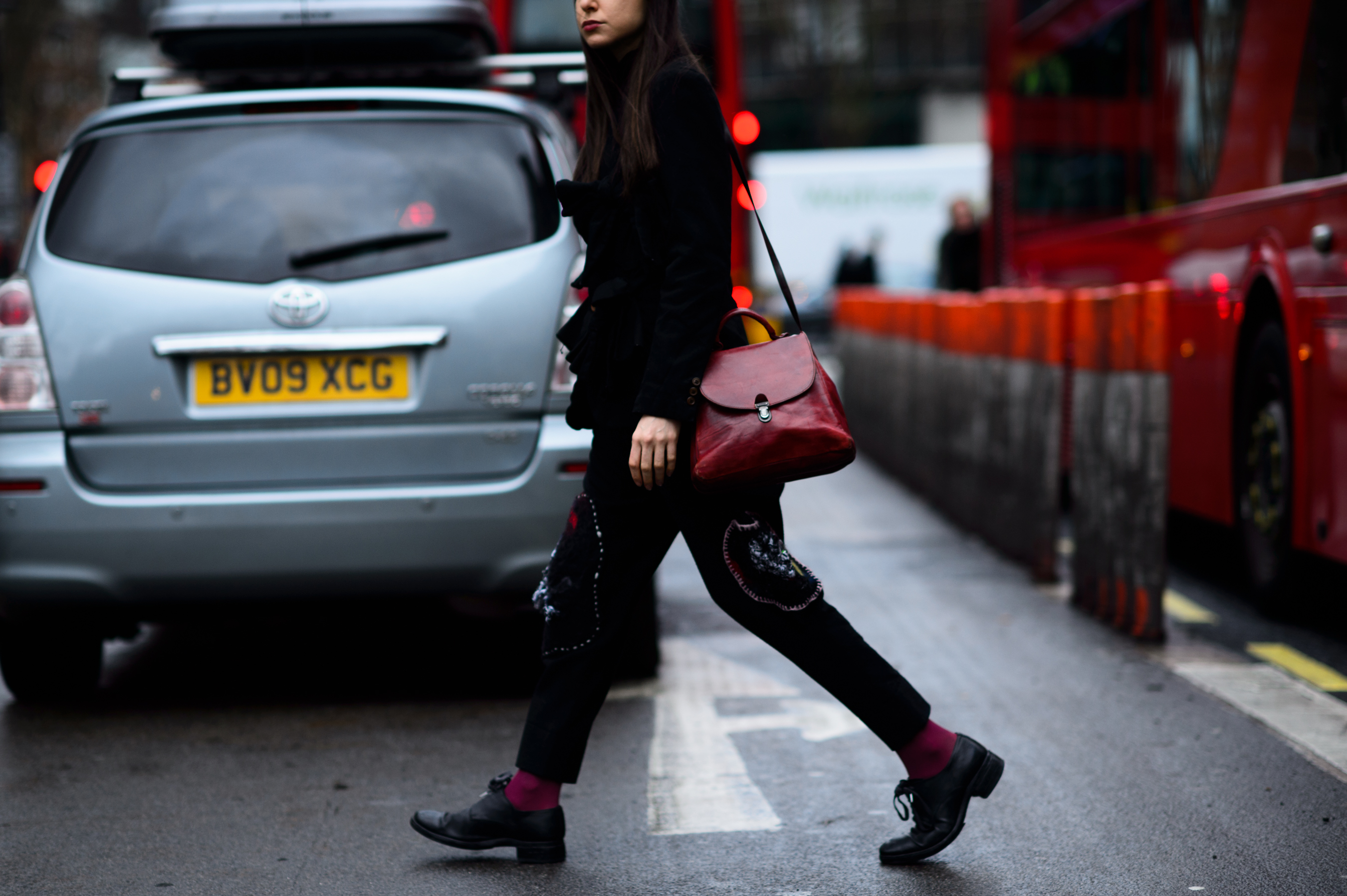 Blogger wearing black and red bag