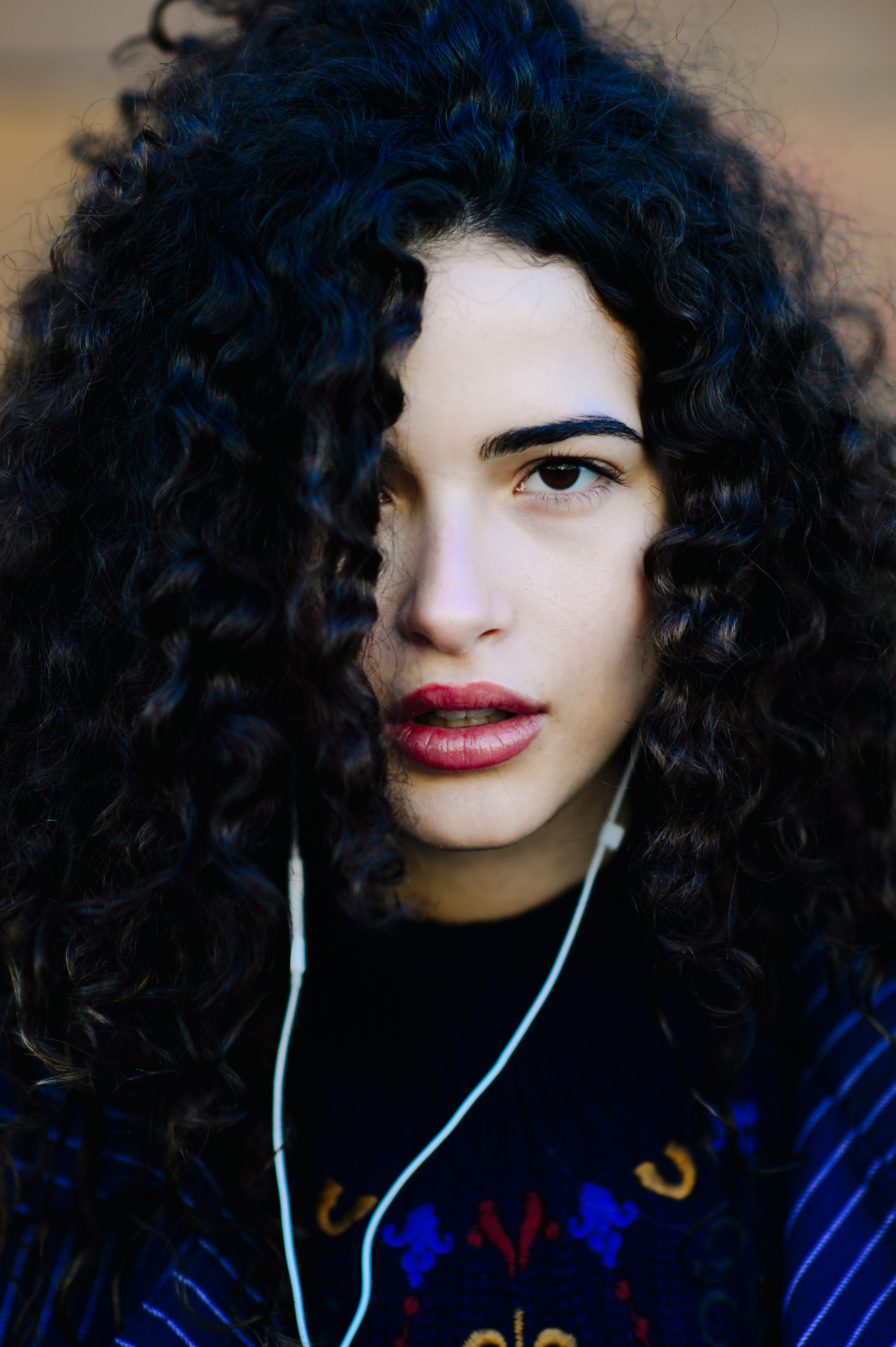 Portrait of Italian girl curly hair