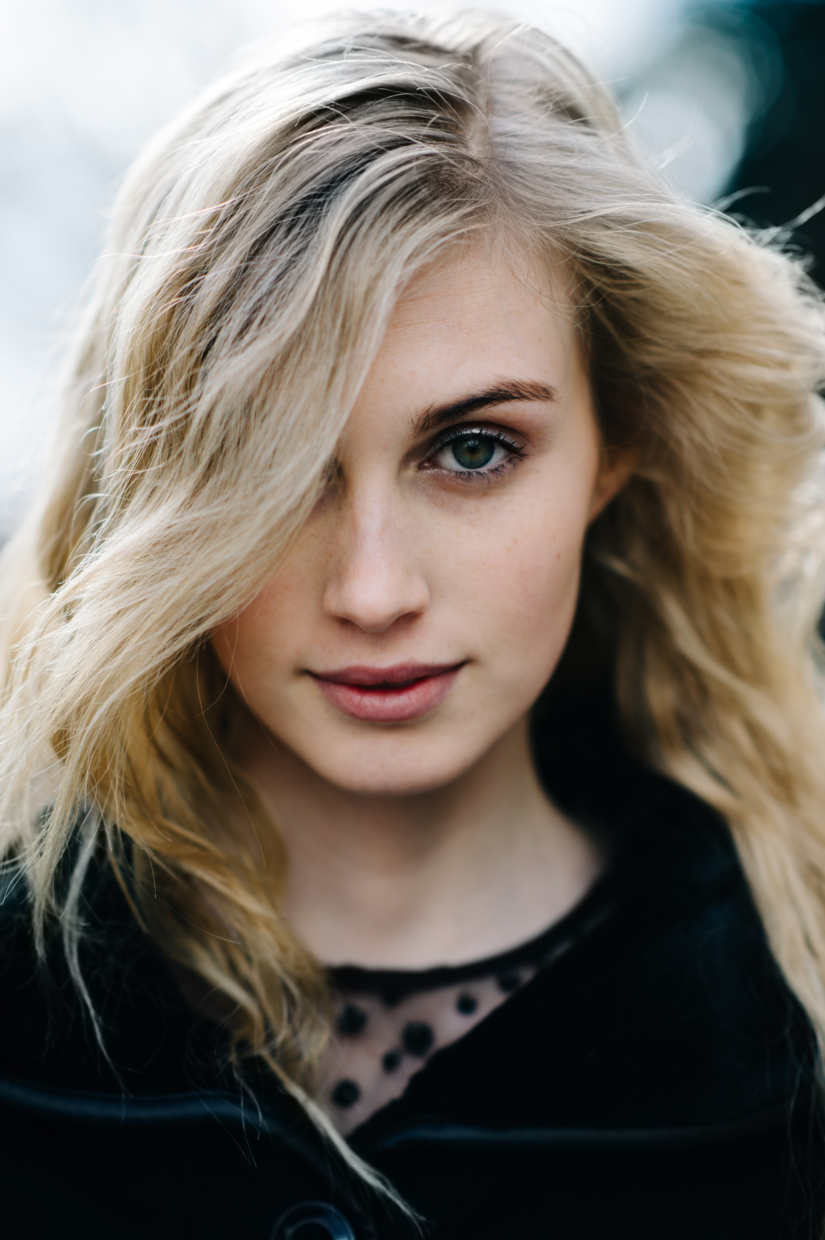 Portrait of a blonde girls with green eyes
