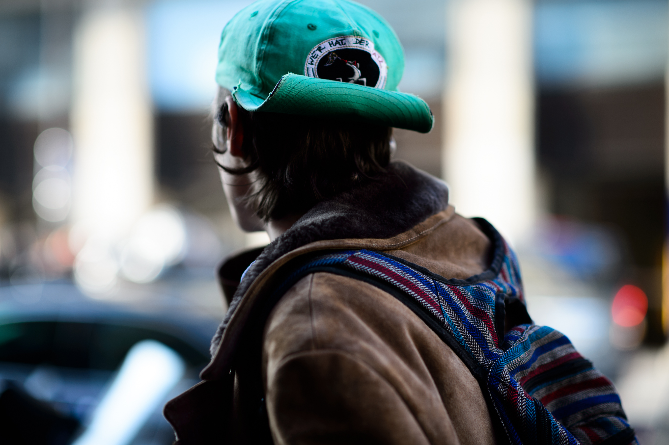 German male model wearing green cap