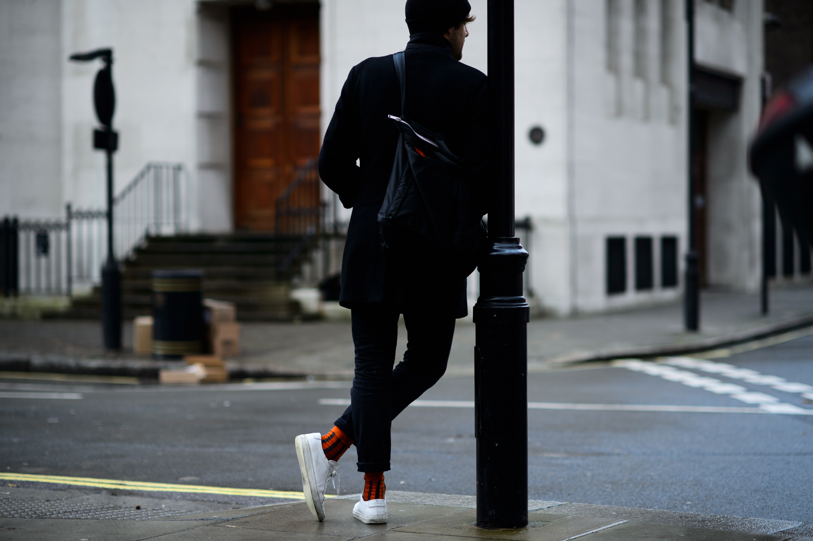 Man wearing orange socks