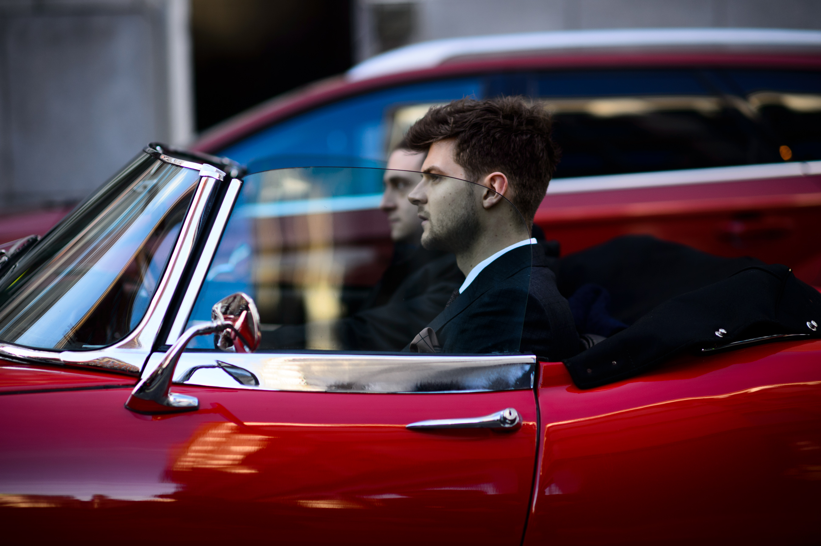 British male blogger in vintage car