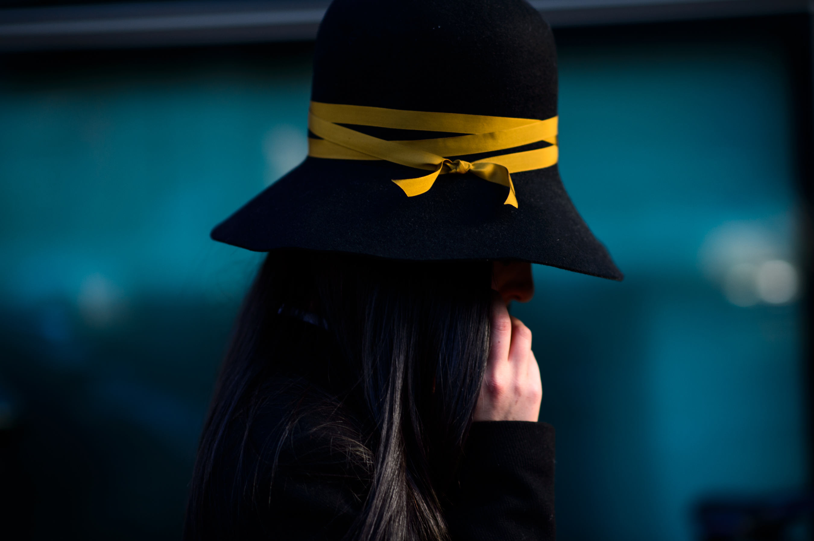 Italian woman wearing ribbon hat