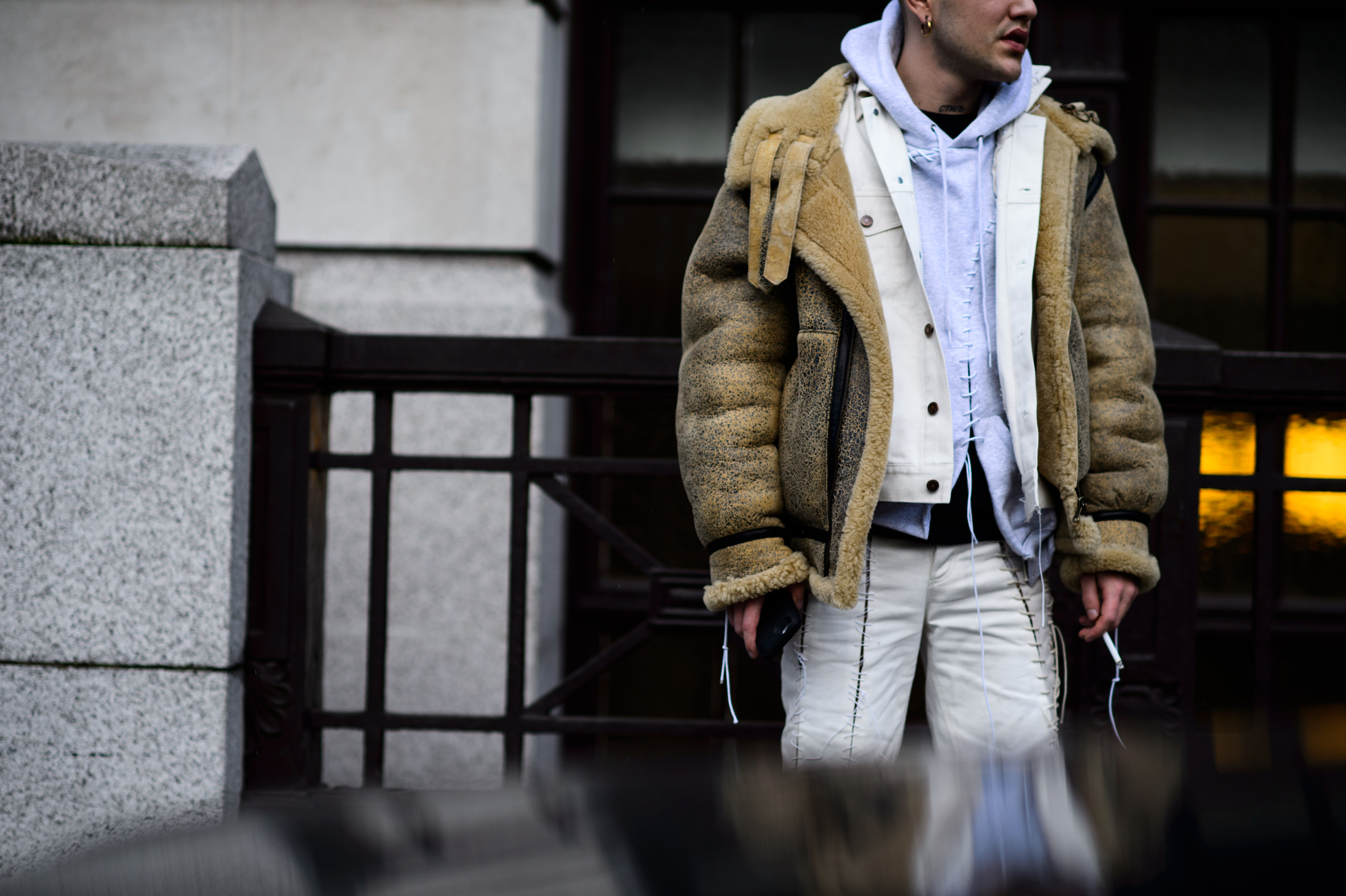 Man wearing outfit with stitches