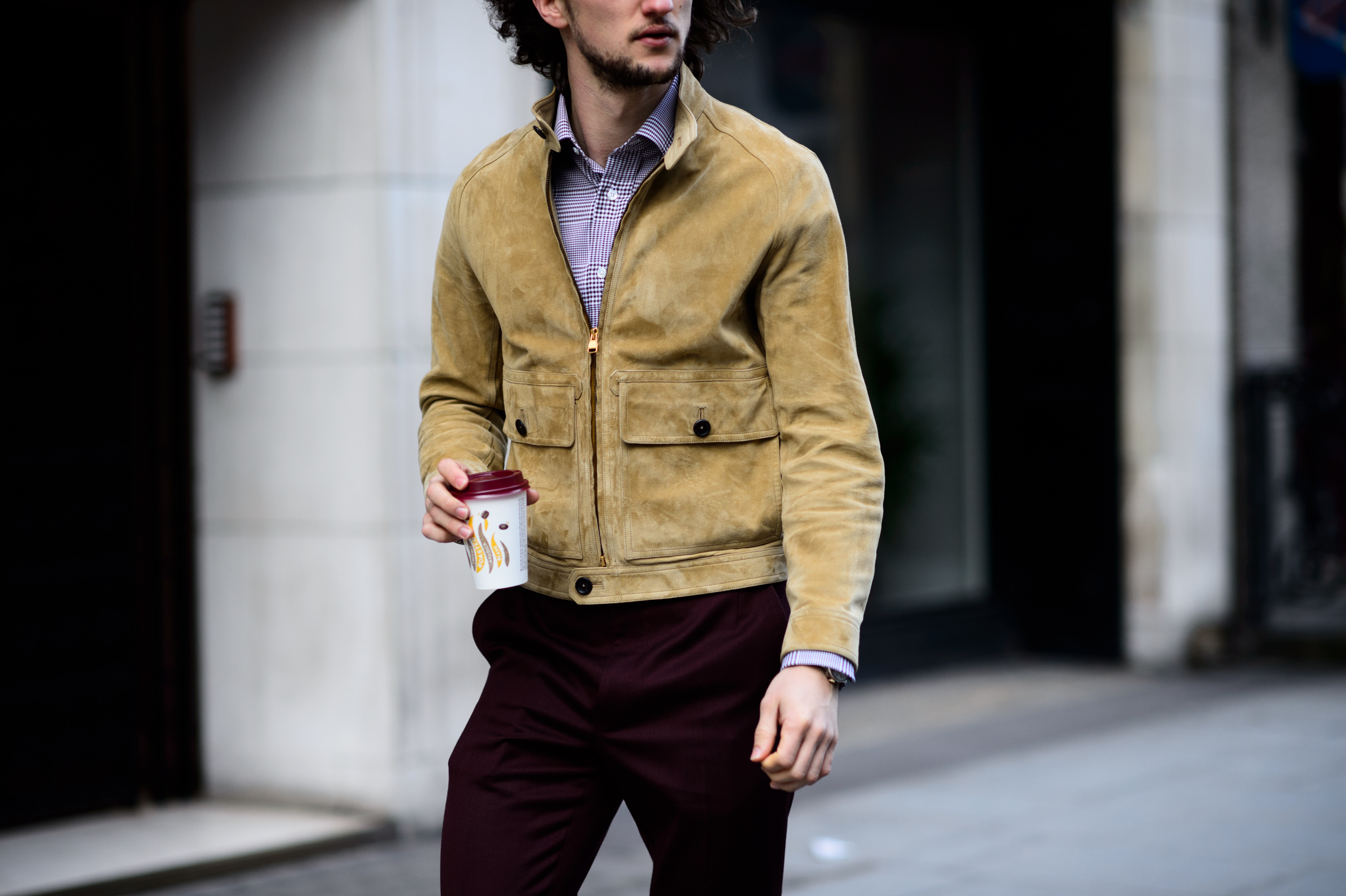 Man wearing velvet camel jacket