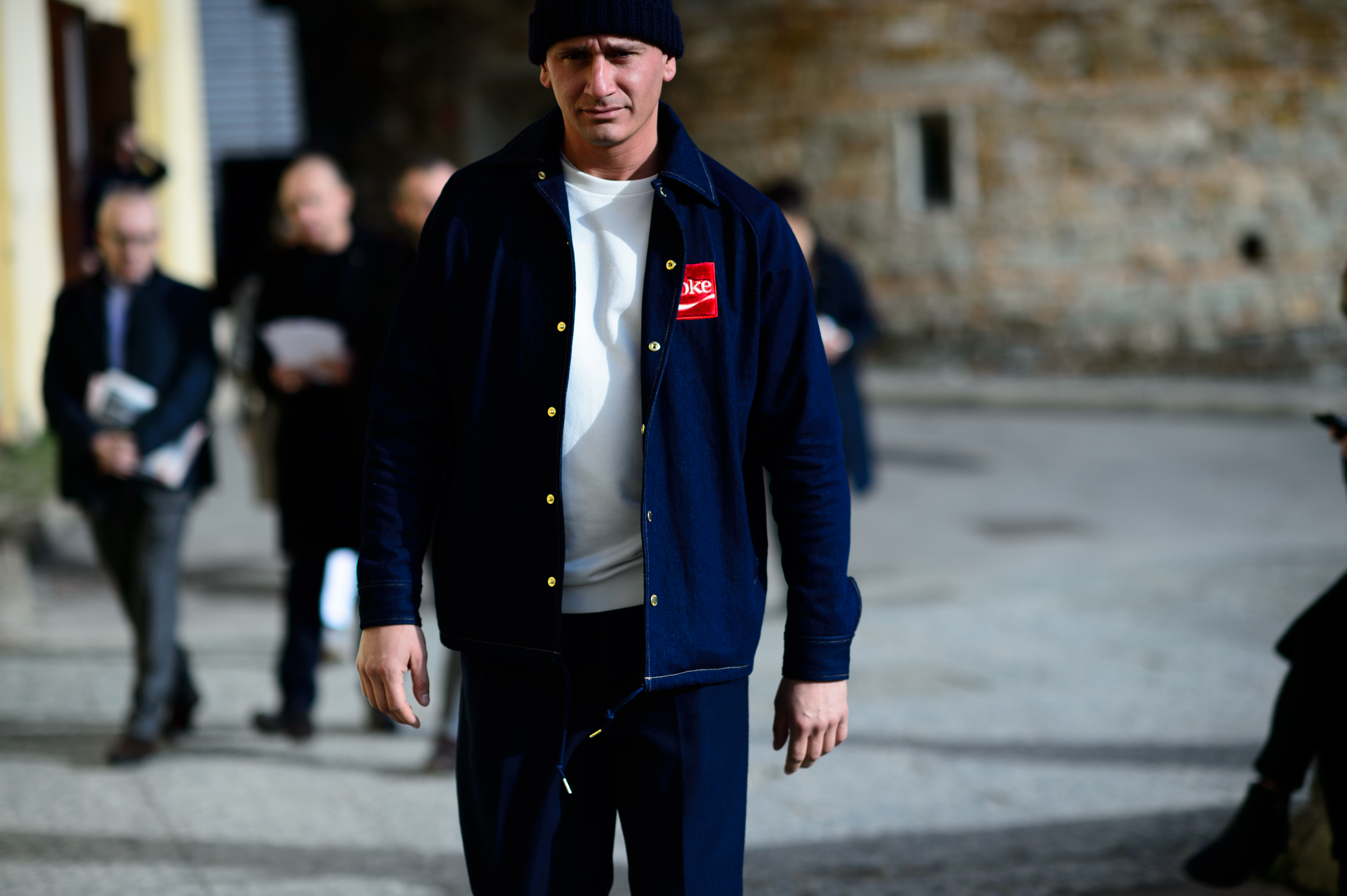 Man wearing coke bomber jacket