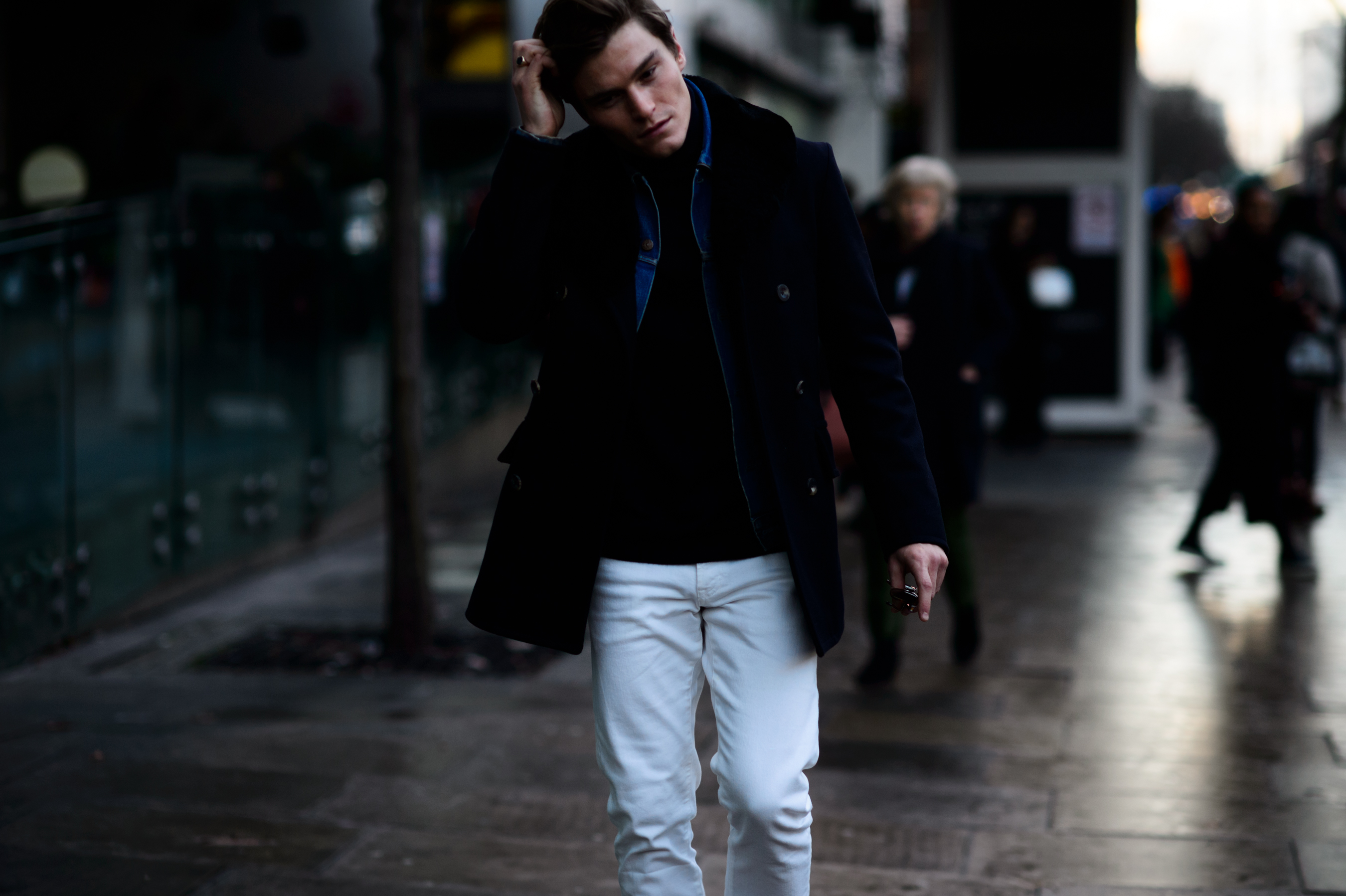 British male model wearing white pants