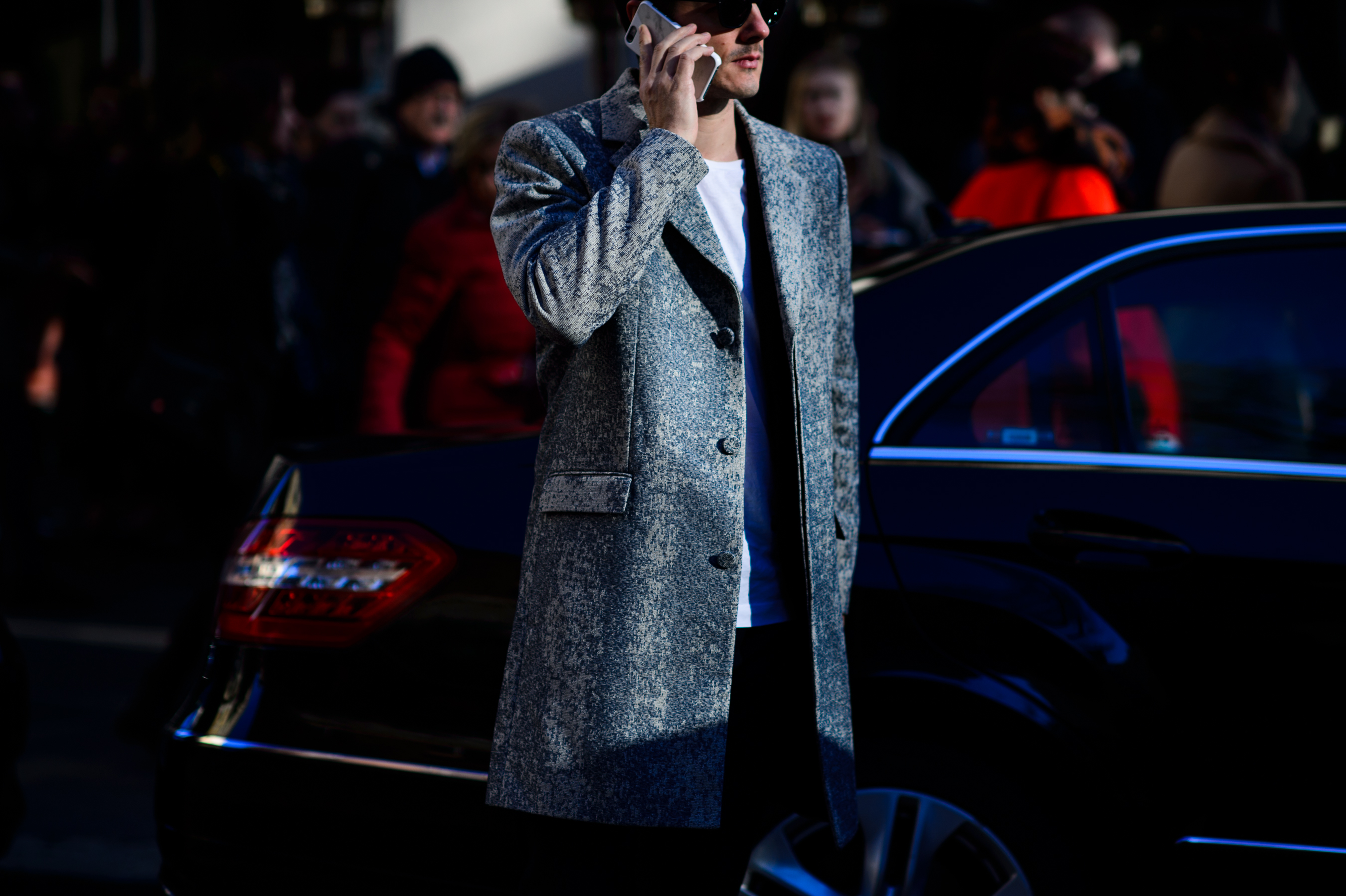 Man in a grey coat after the show