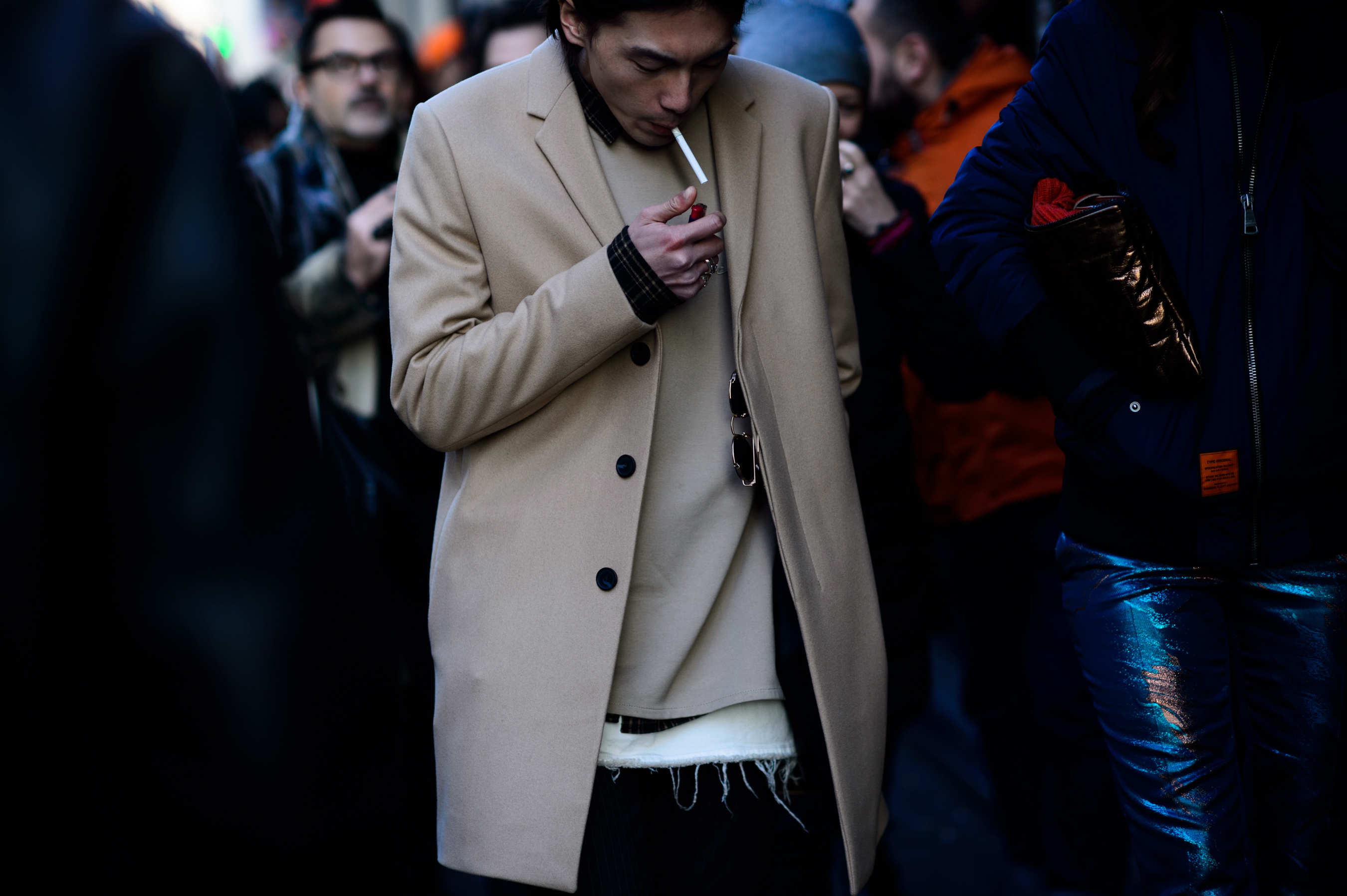 Philippine designer wearing beige coat
