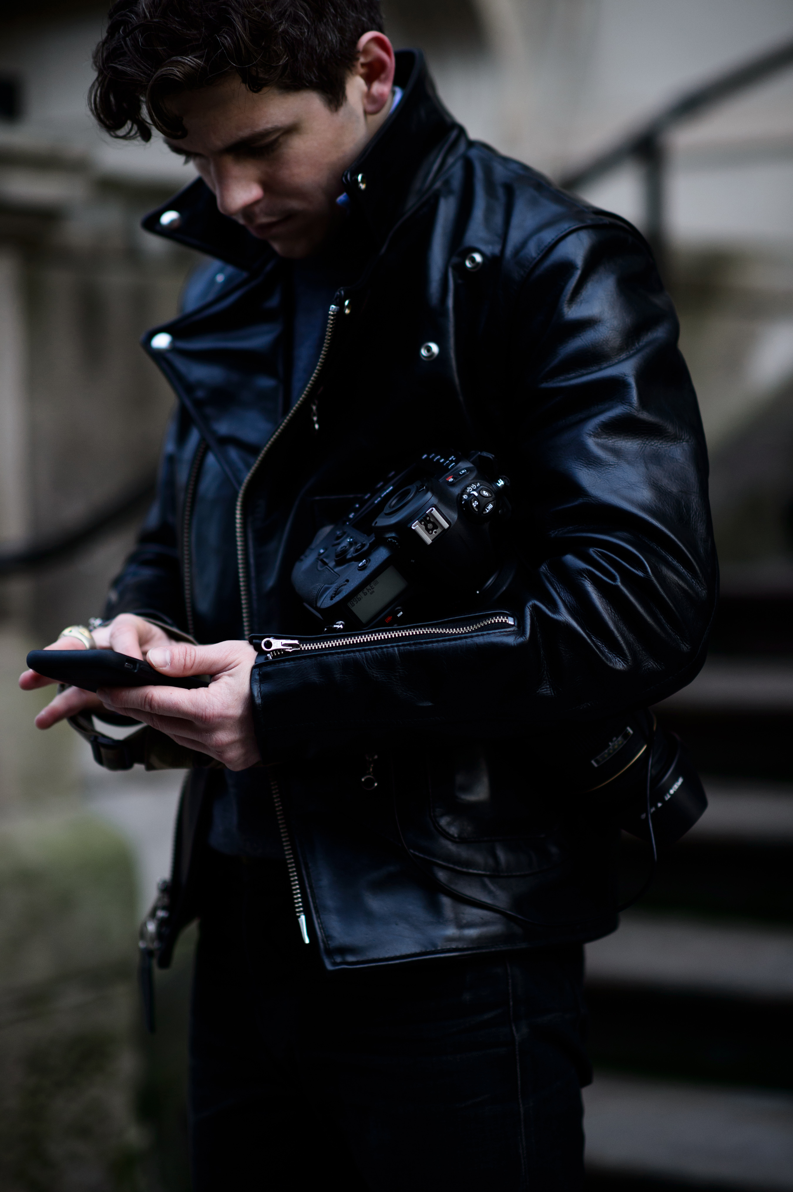 American photographer wearing leather jacket