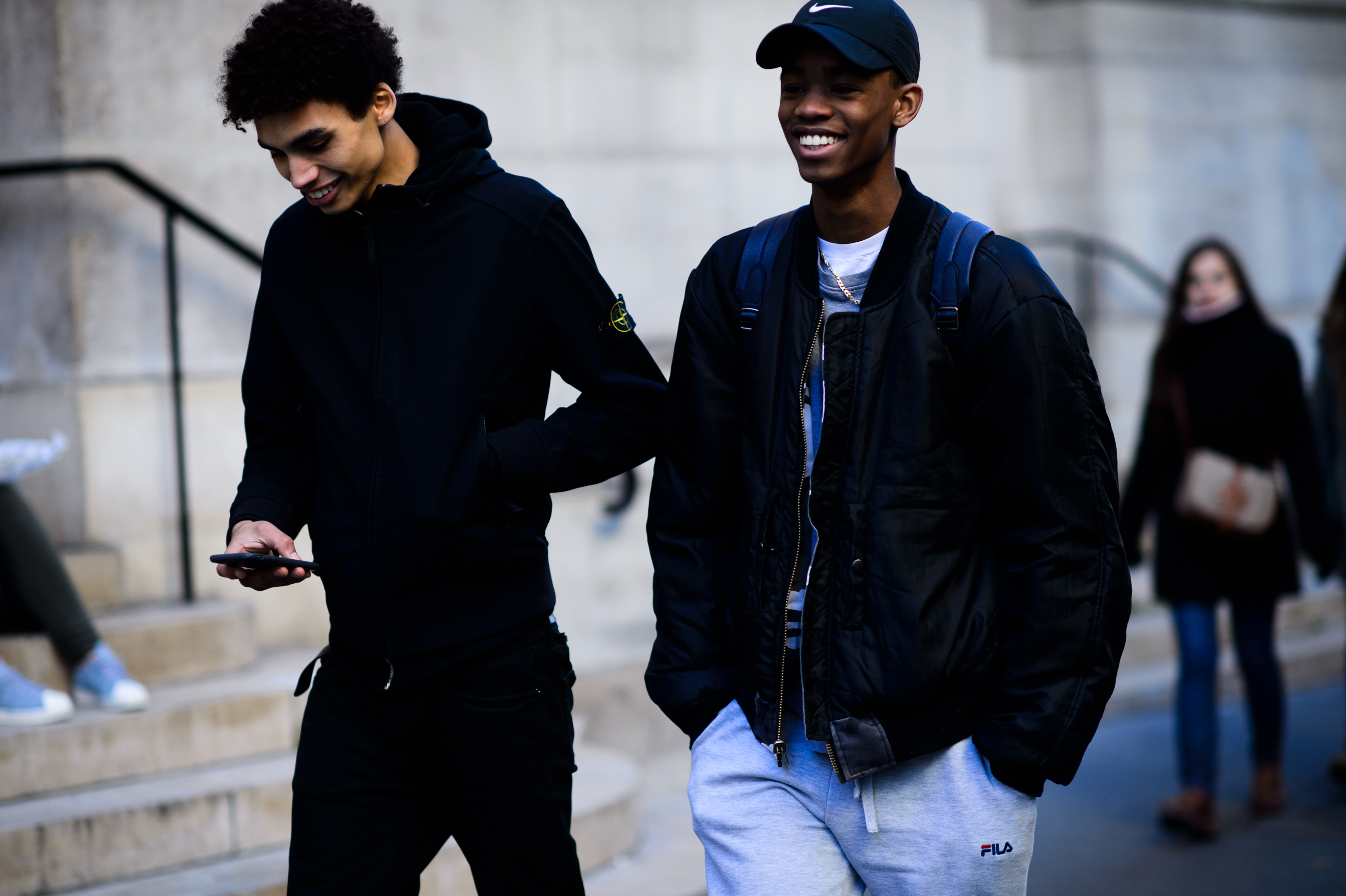 Two male models after the show