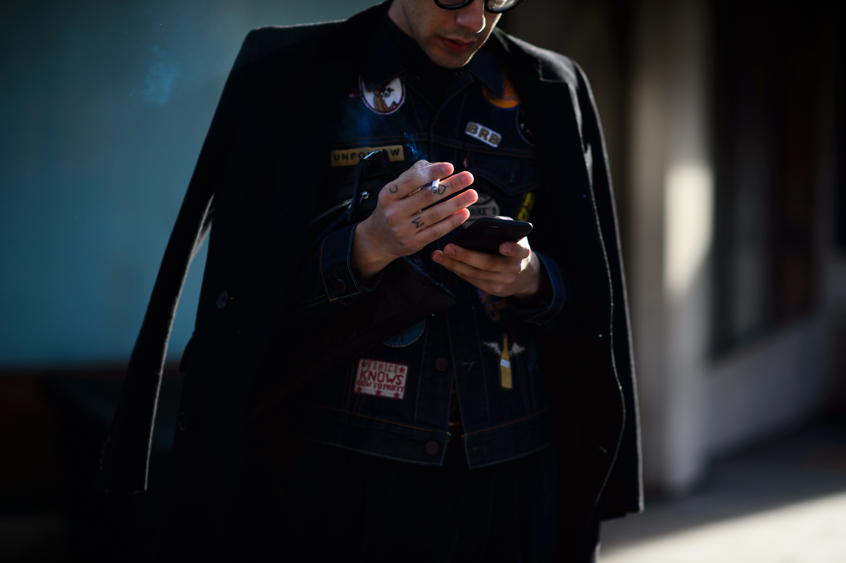 Man wearing vest with patches