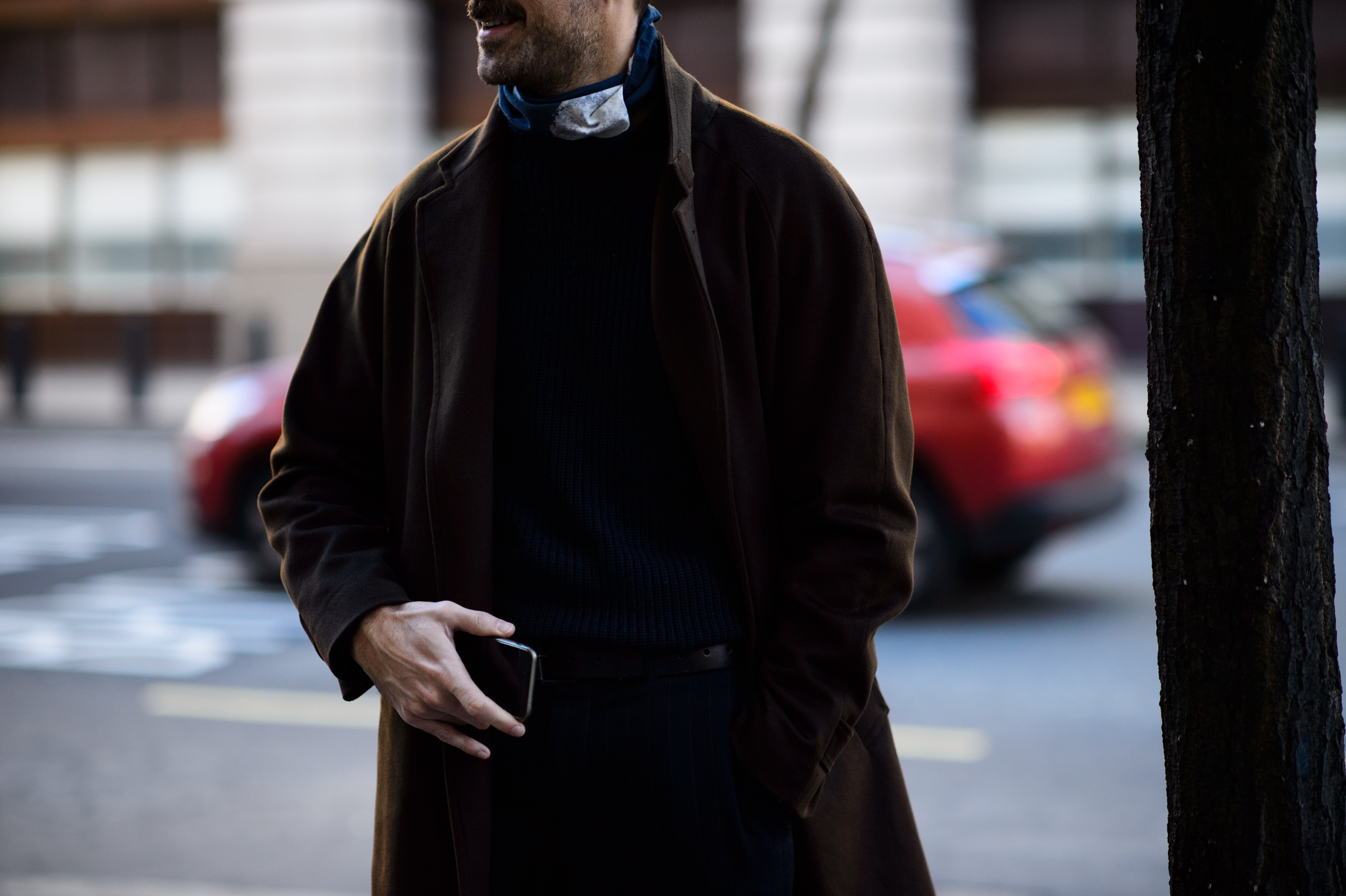 Man wearing brown coat