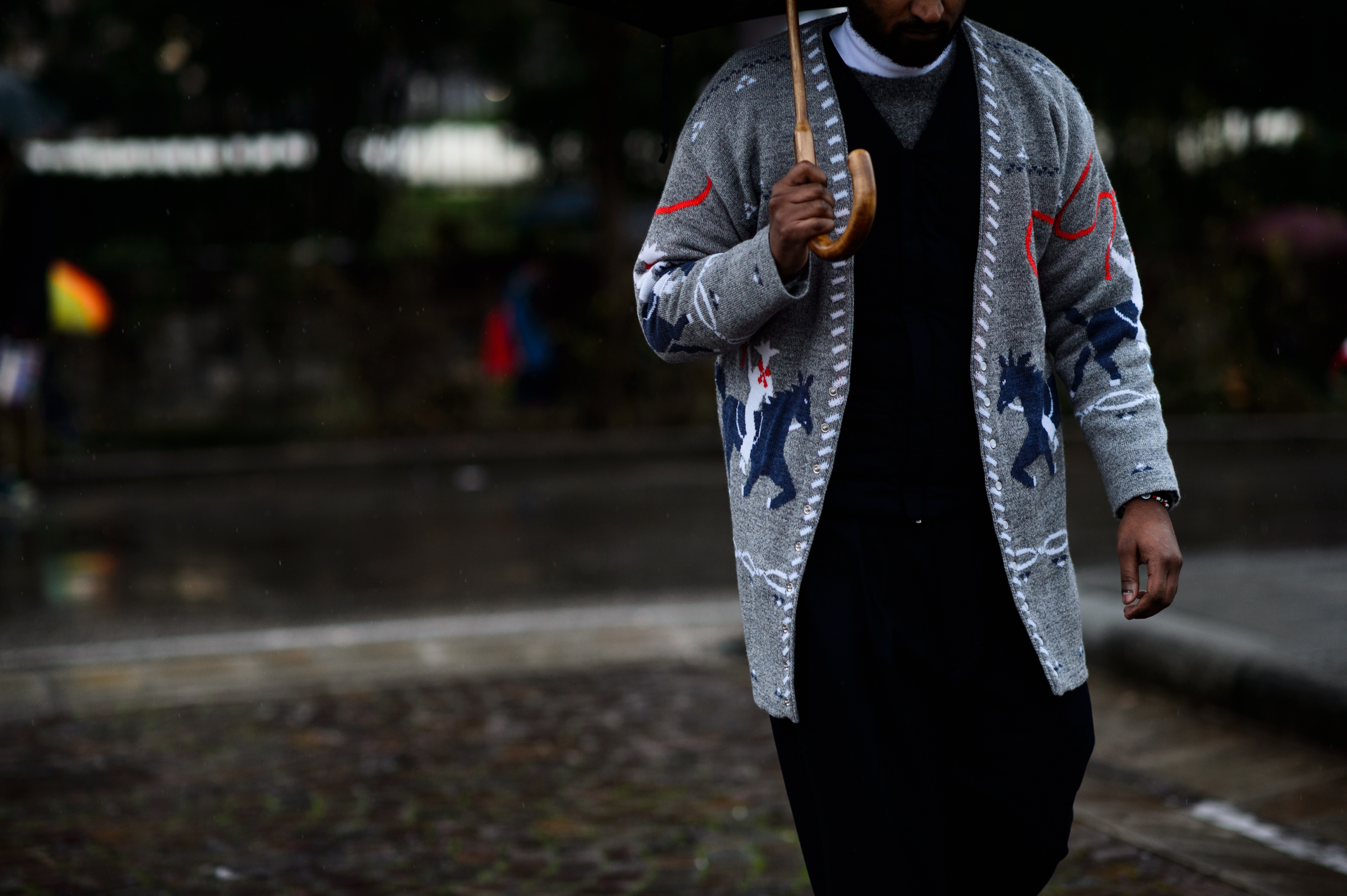 Man wearing warm cardigan