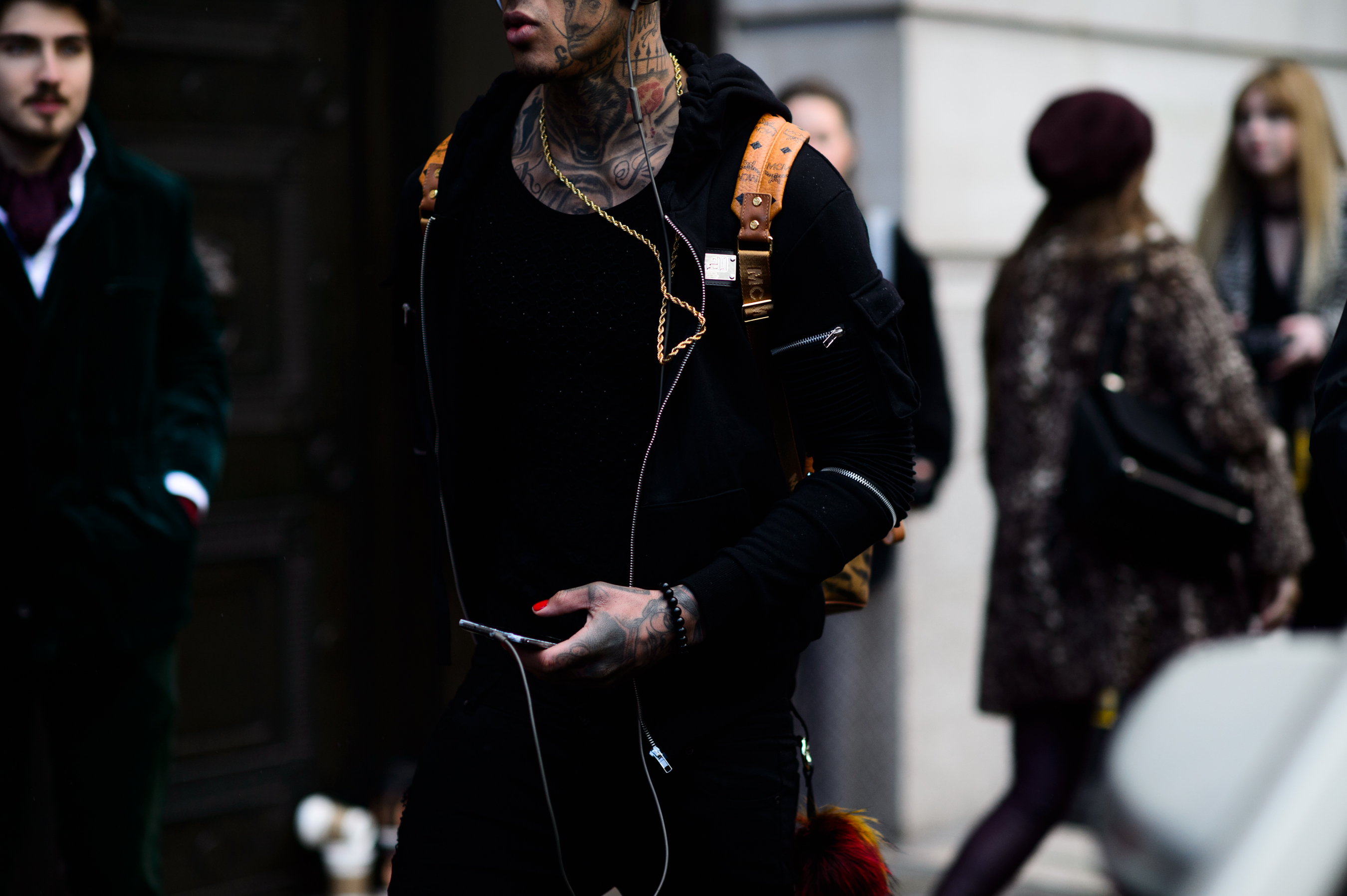 Man with tattoos on this face