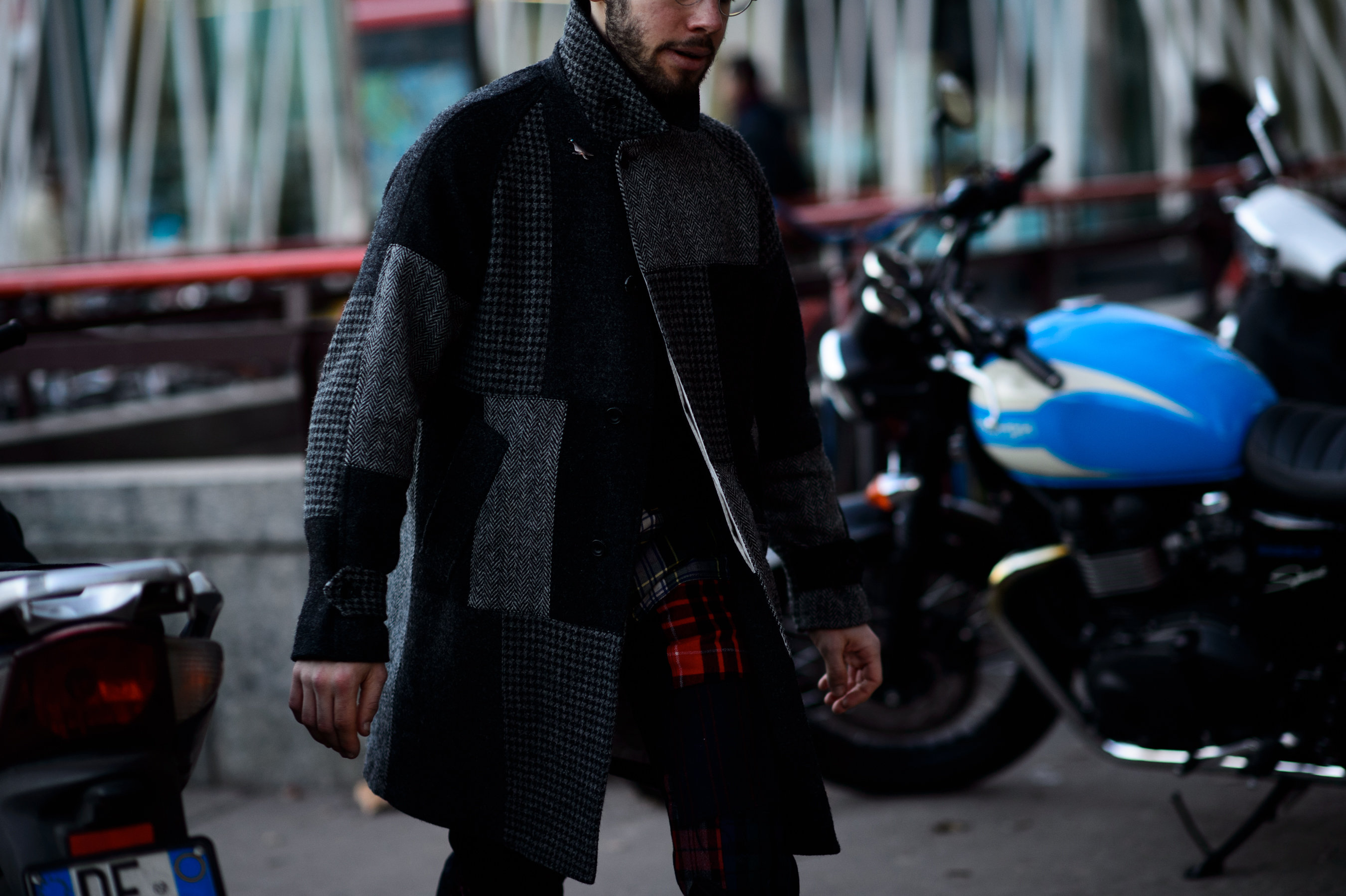 Man wearing patchwork denim