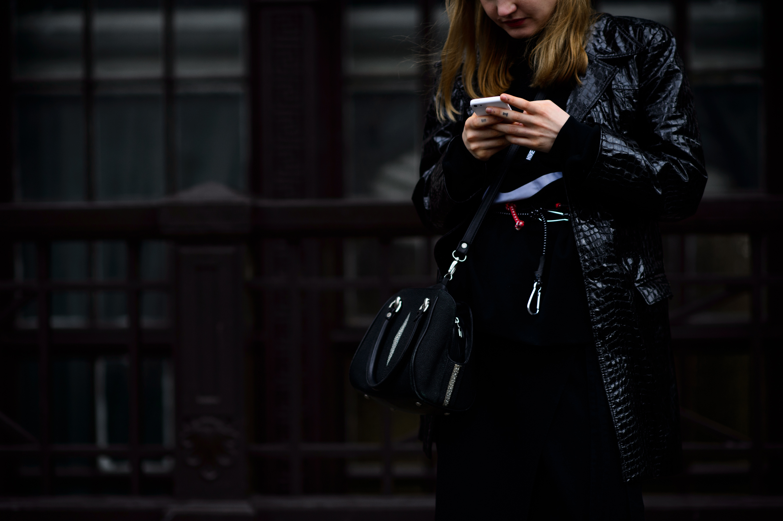 Girl wearing leather print coat