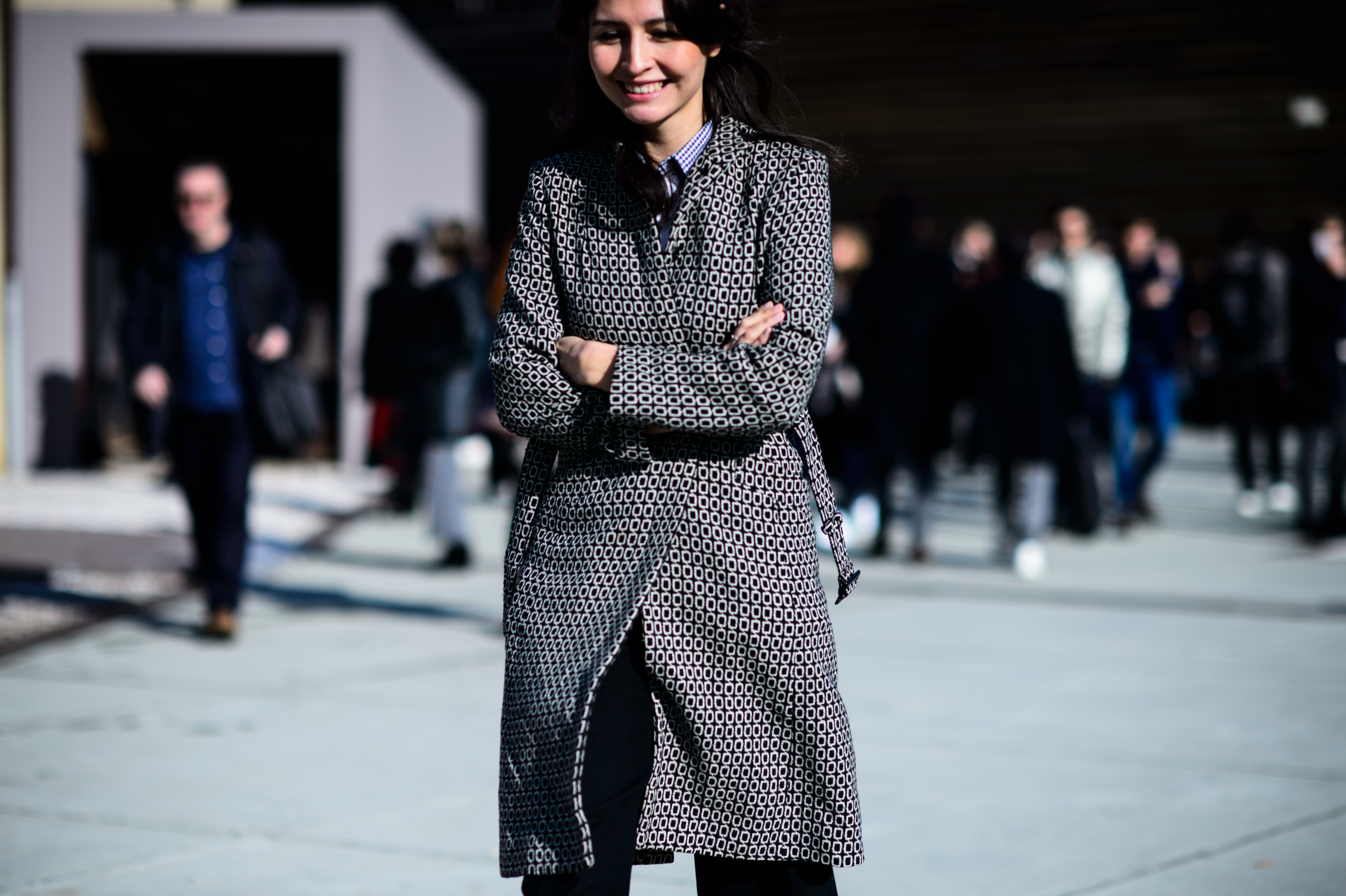 Woman wearing monochrome coat