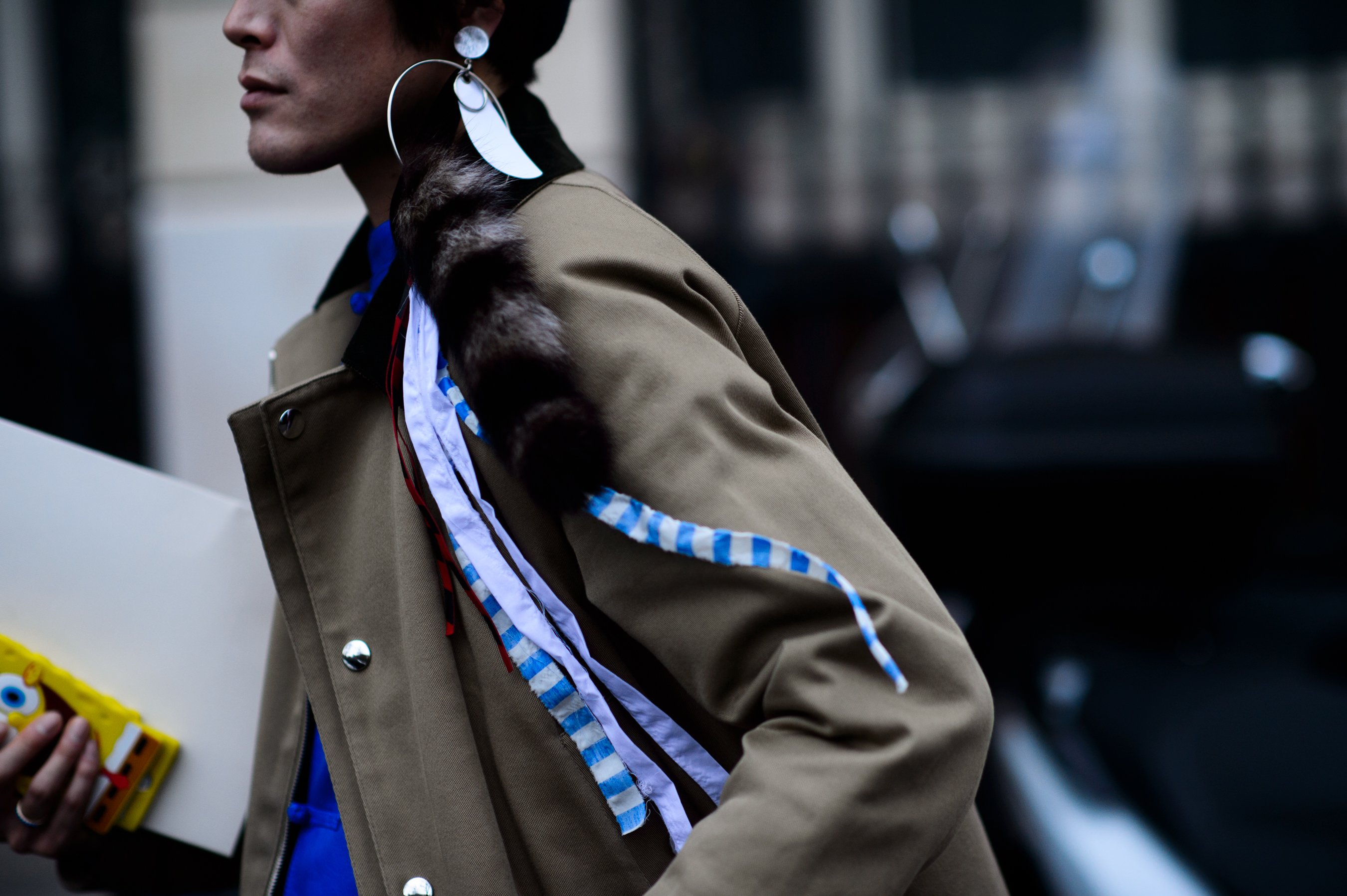 Japanese man wearing big earring