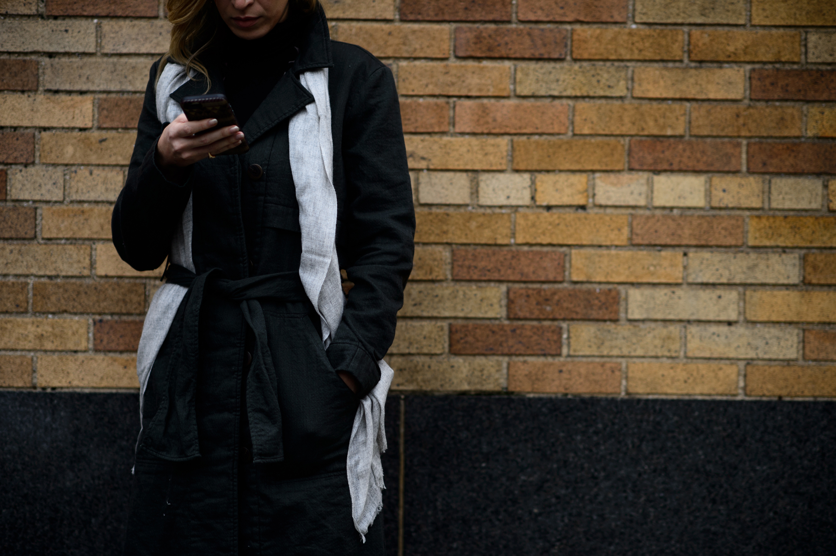 Woman wearing grey jumpsuit