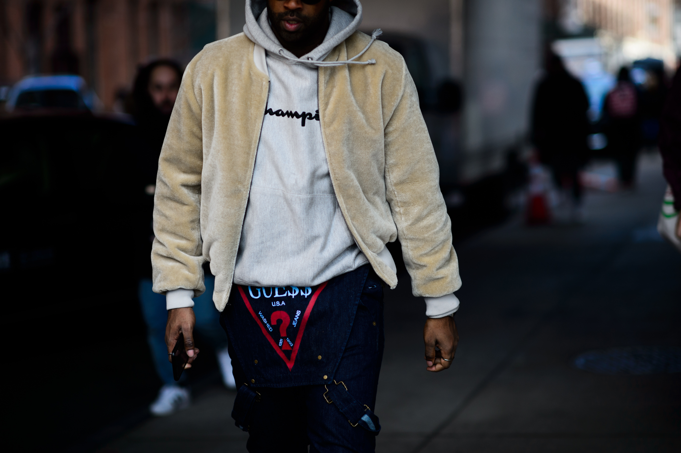Man wearing denim jumpsuit