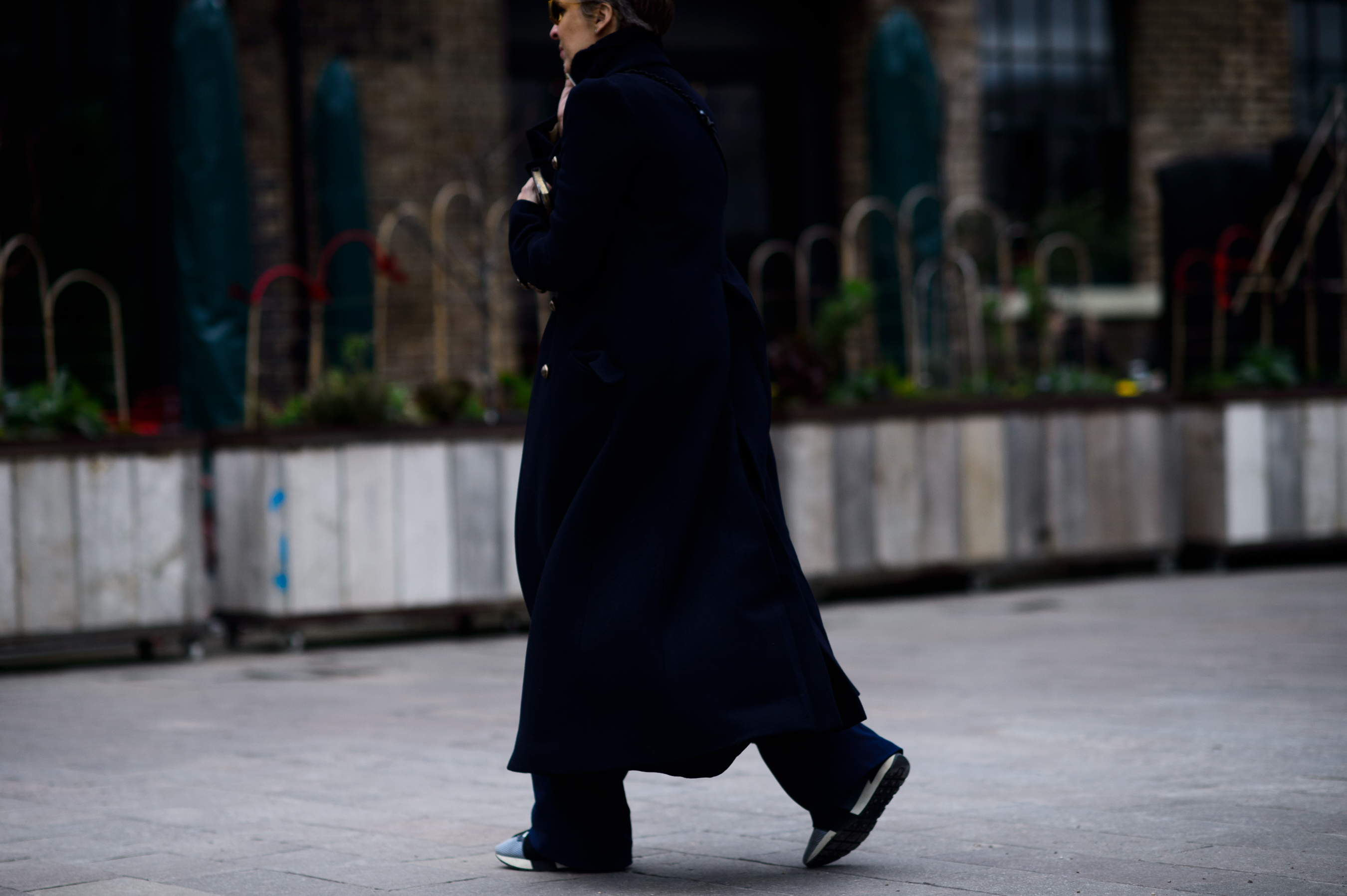 Woman wearing long coat