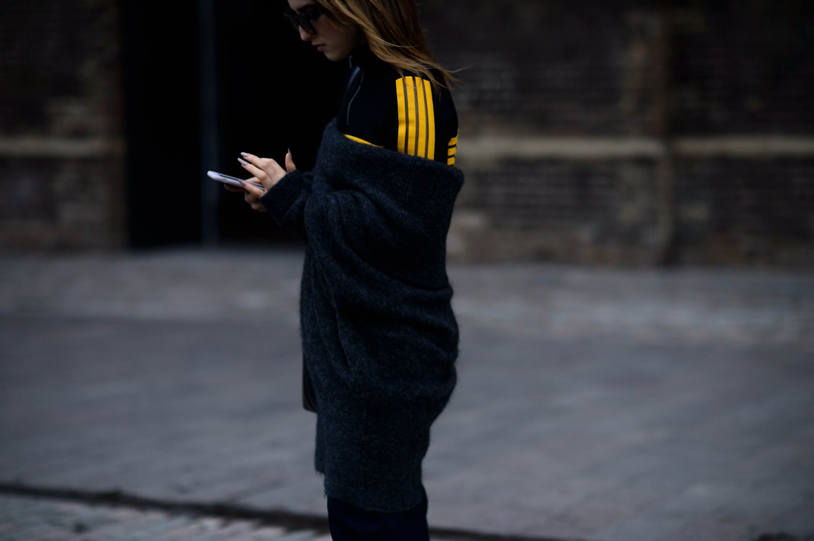 Woman sweater over sport jacket