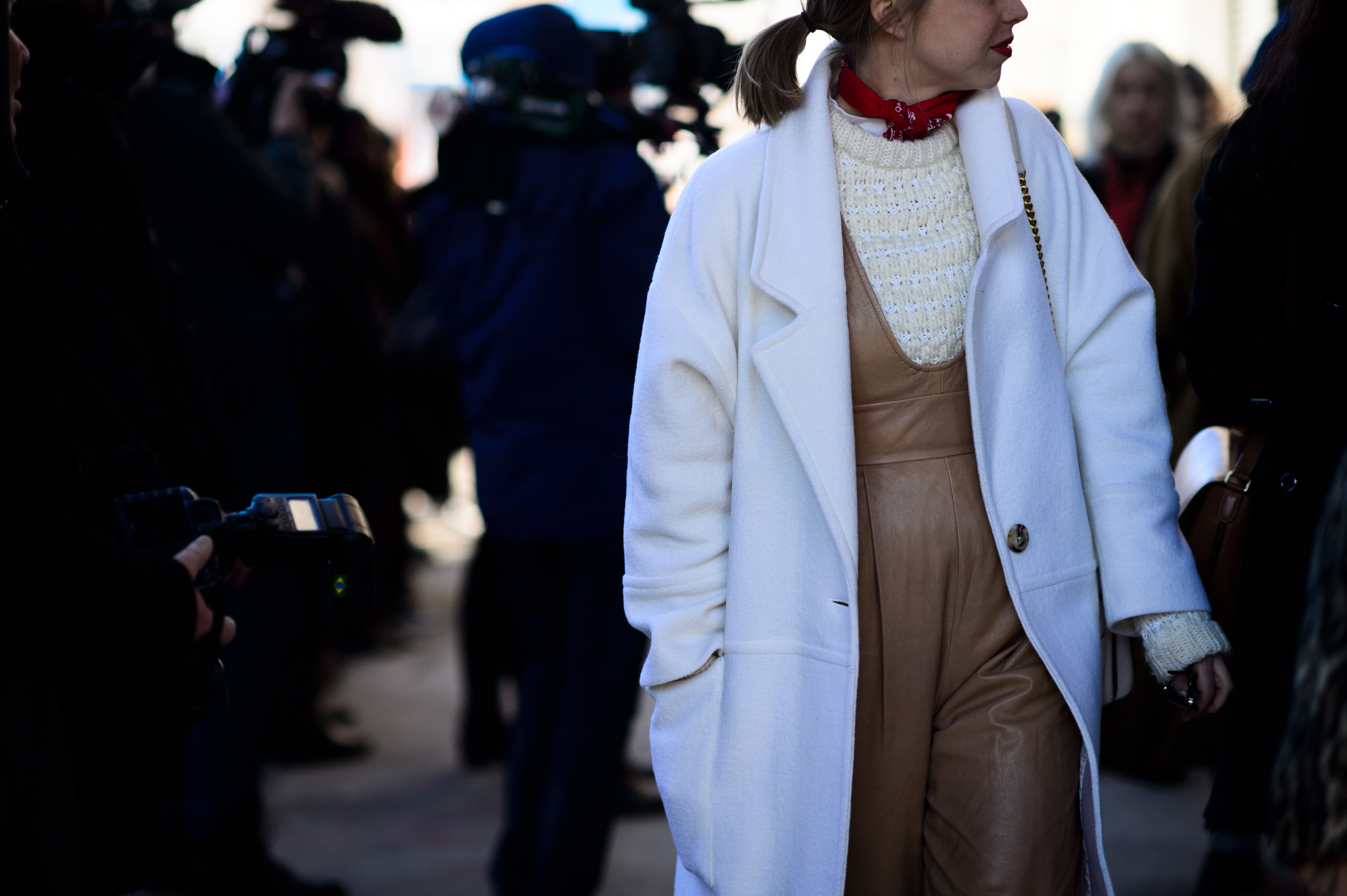 Woman wearing white coat