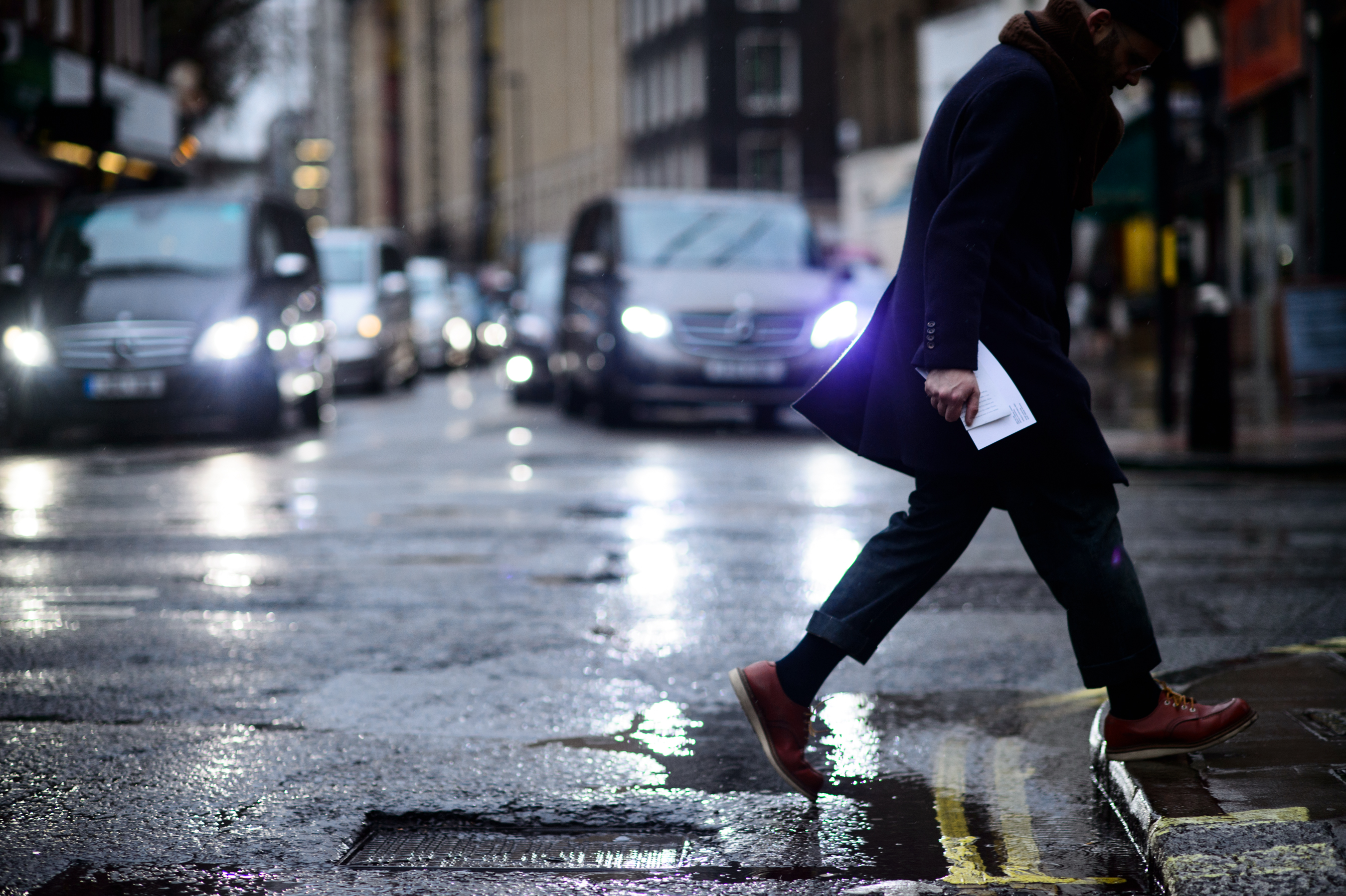 Journalist crossing the road