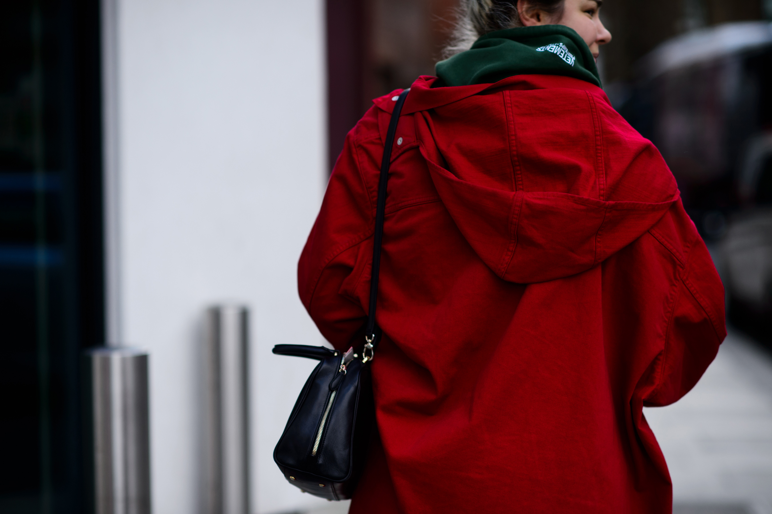 KM20 buyer wearing red denim coat