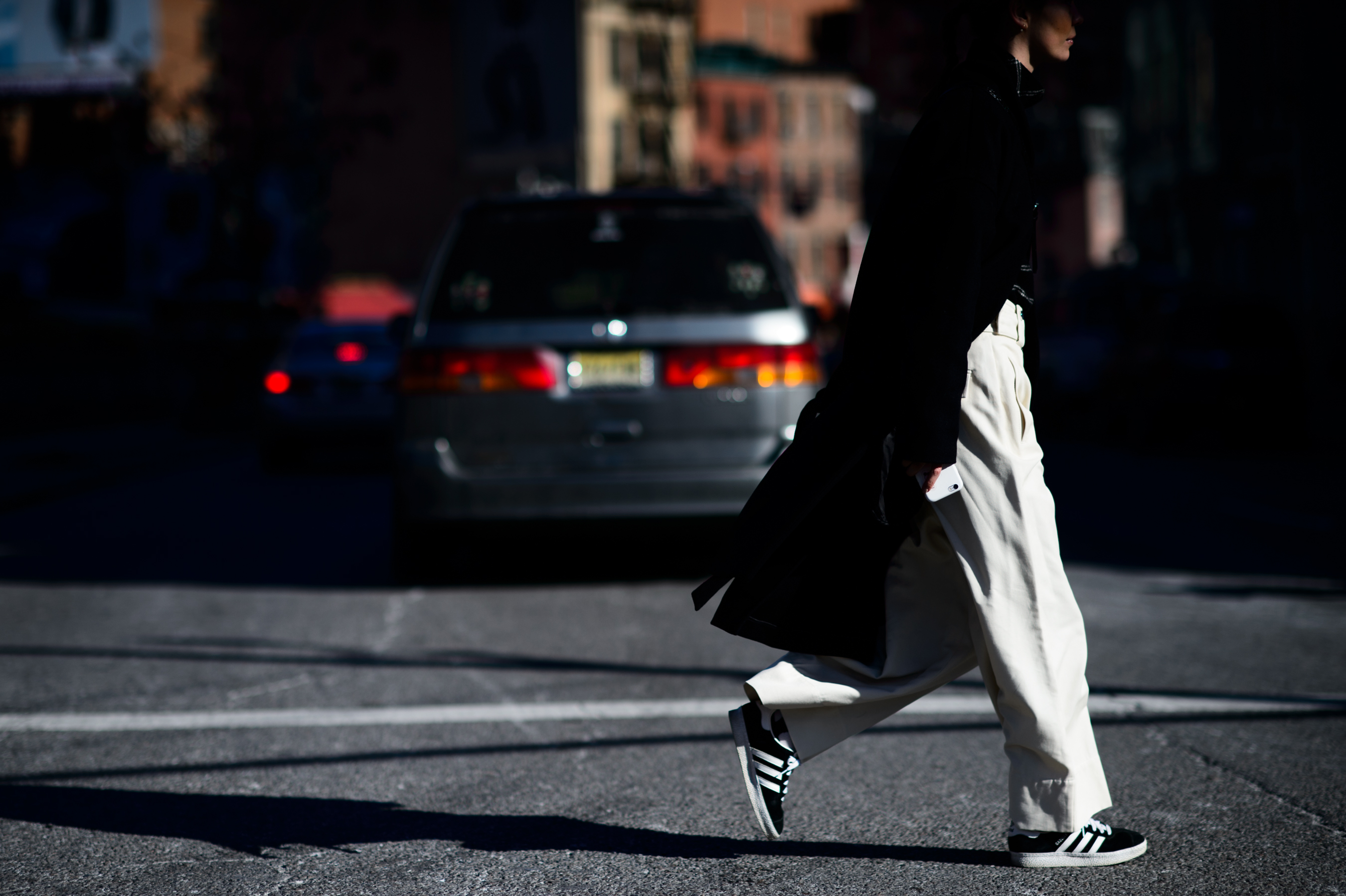 Woman wearing white pants