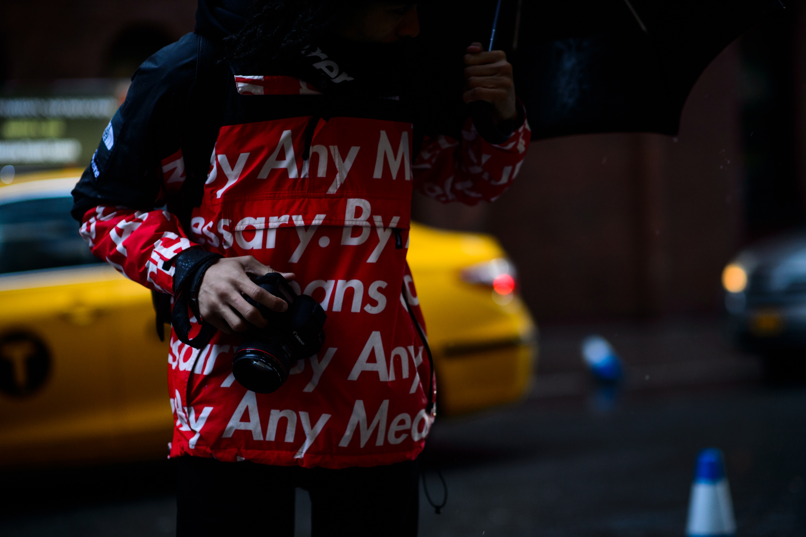 Photographer with umbrella