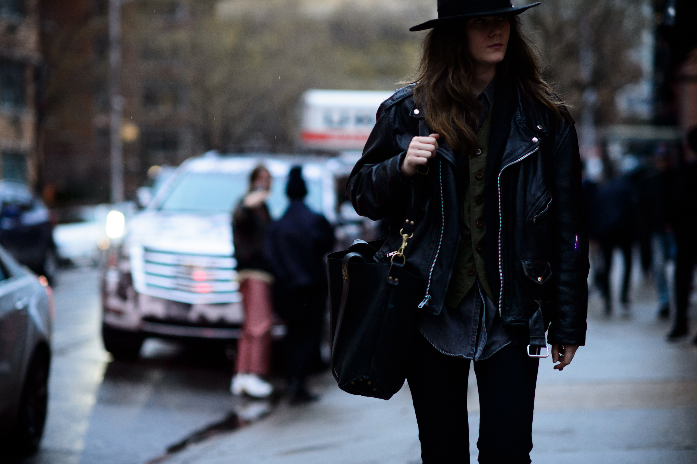 Suited magazine editor wearing black