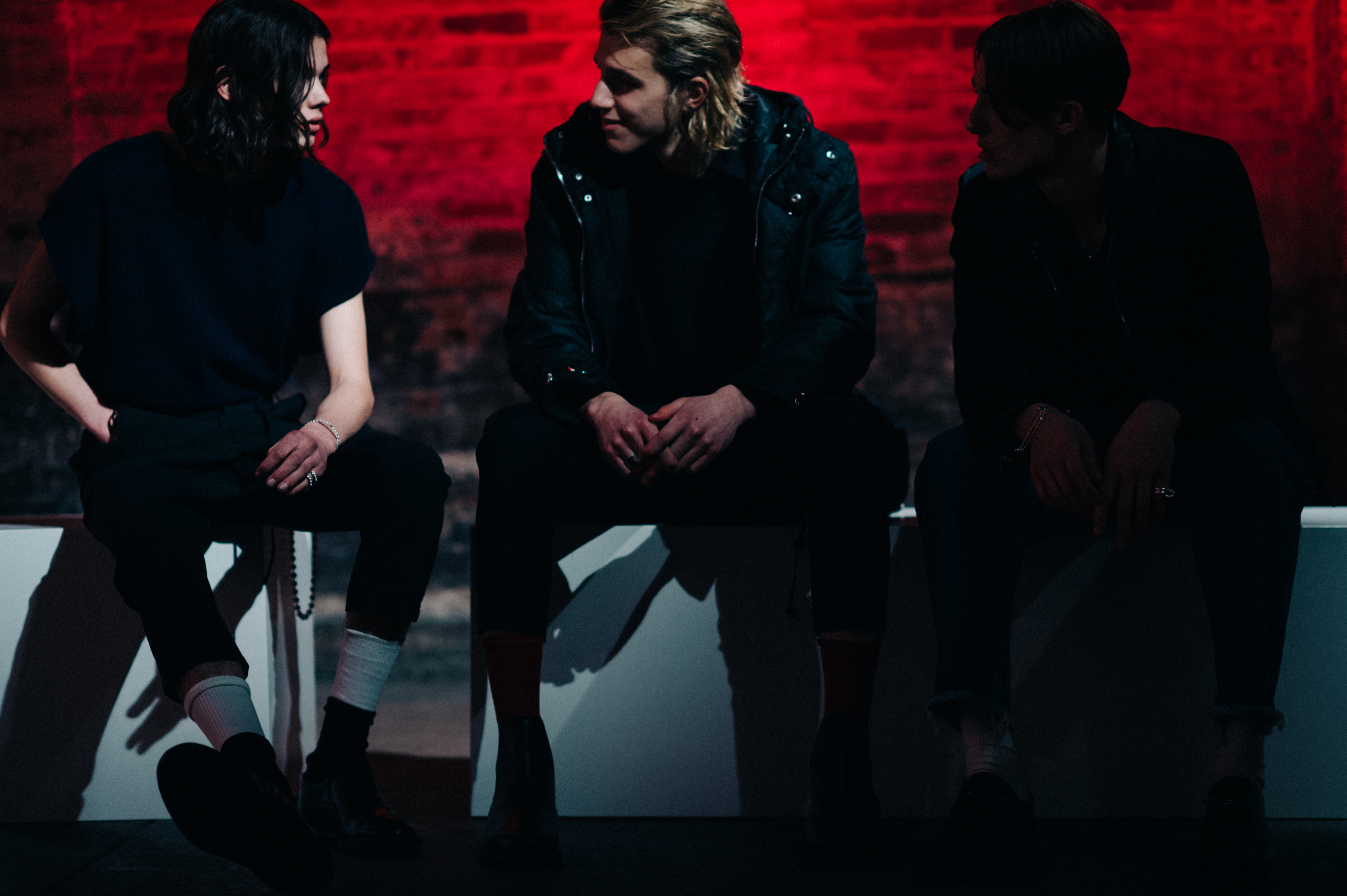 Three models sitting