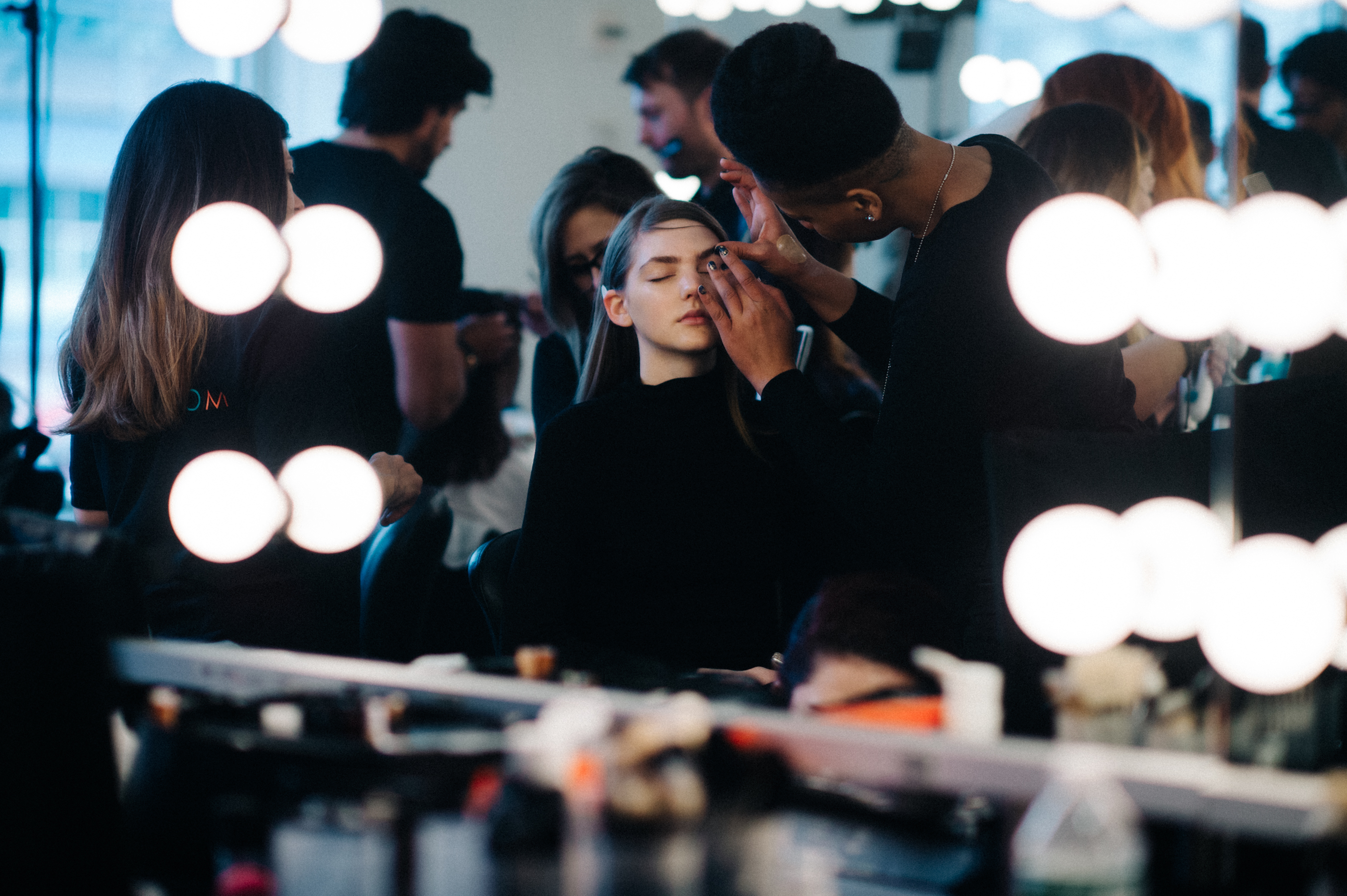 American model getting make up