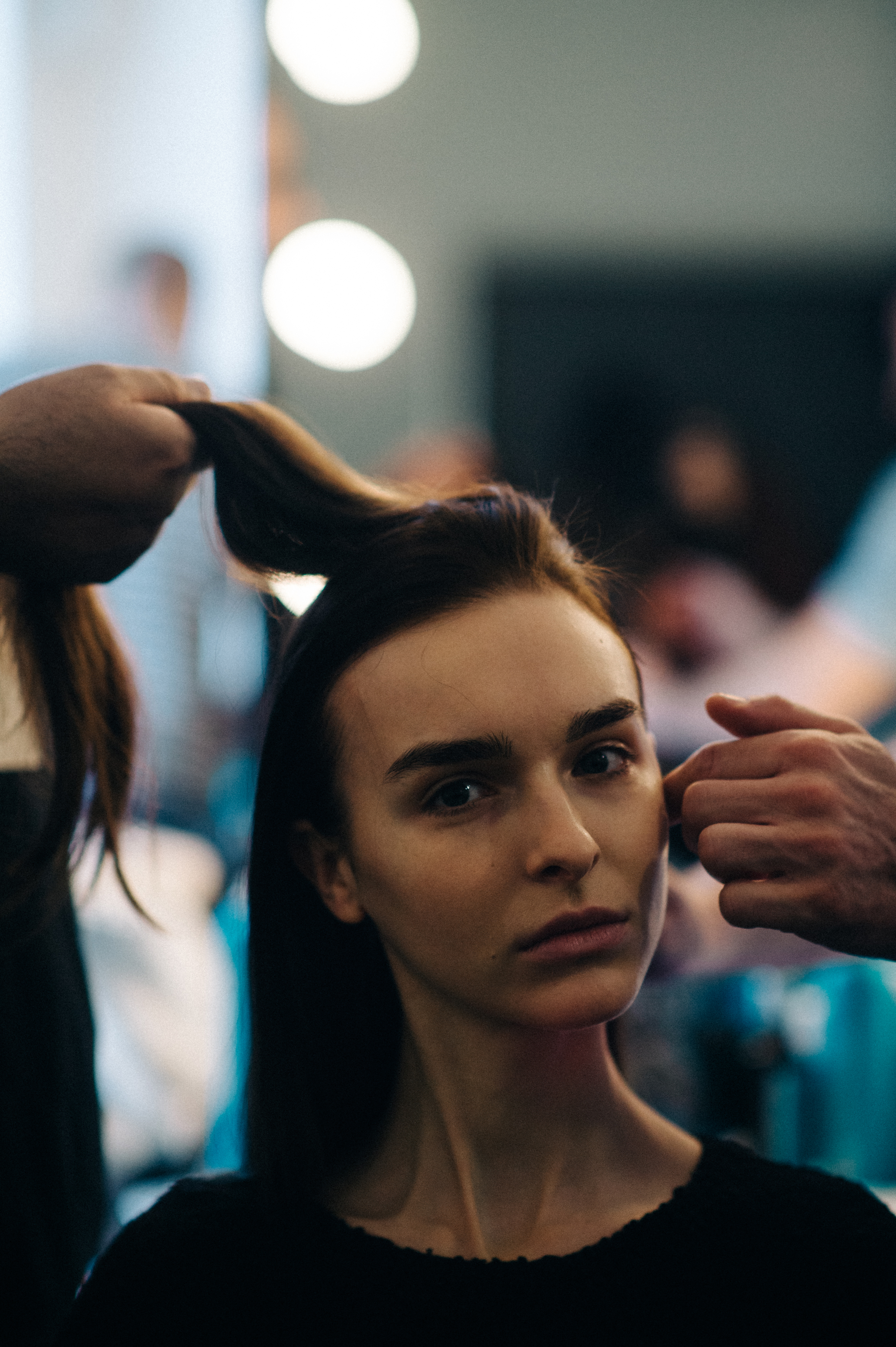 Model getting hair and make up