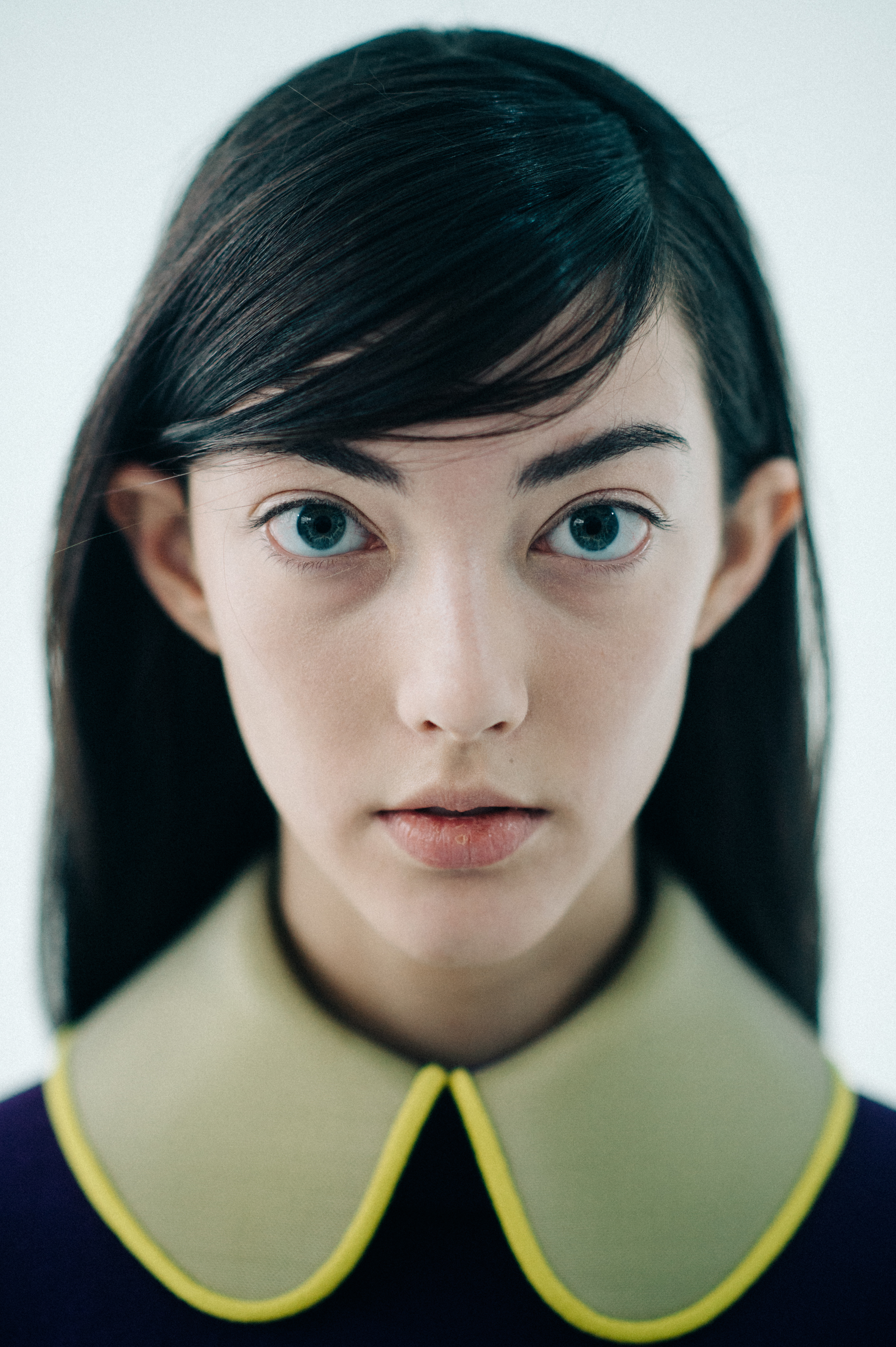 Portrait of a model yellow collar