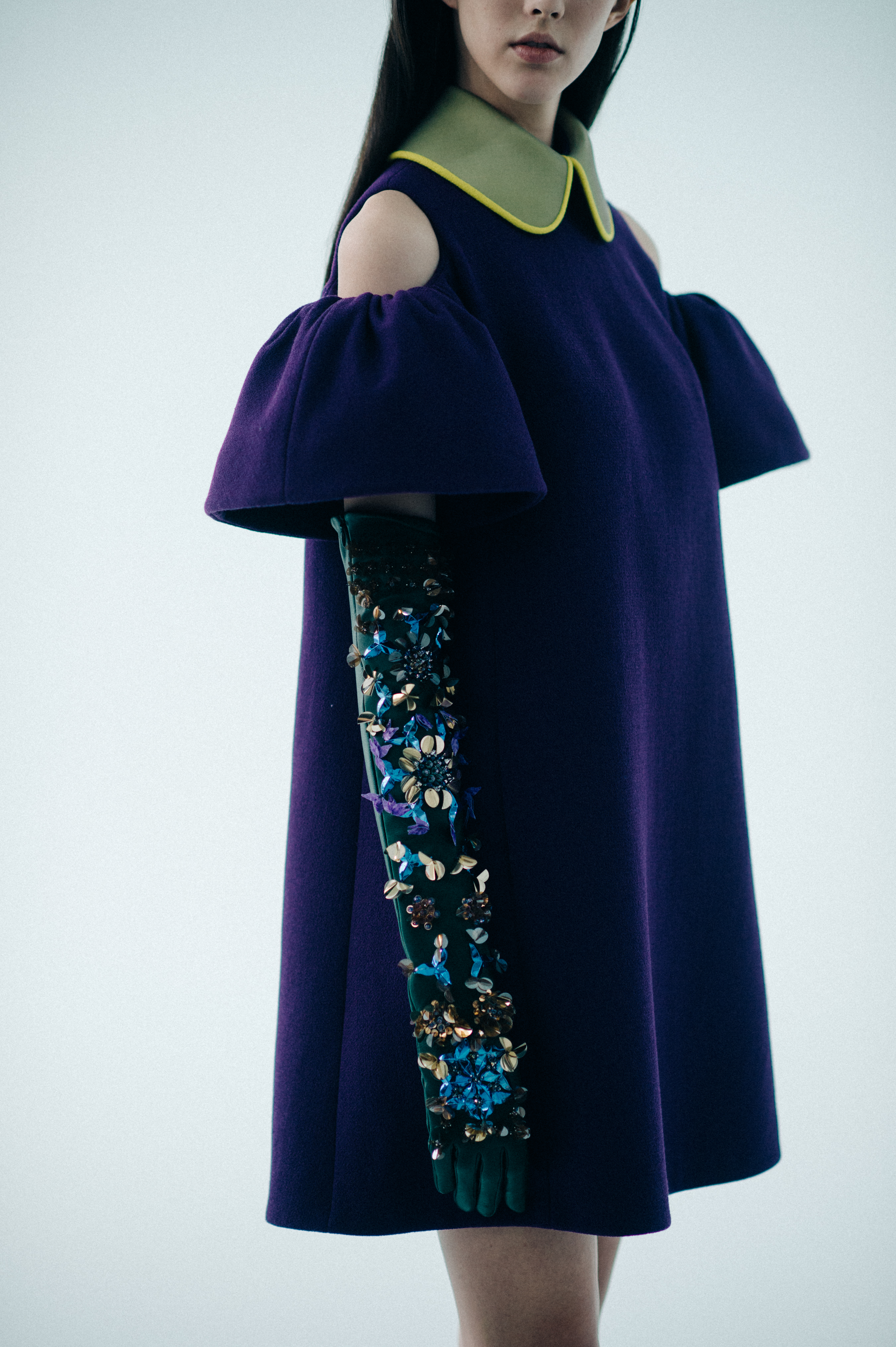 Model dressed in purple